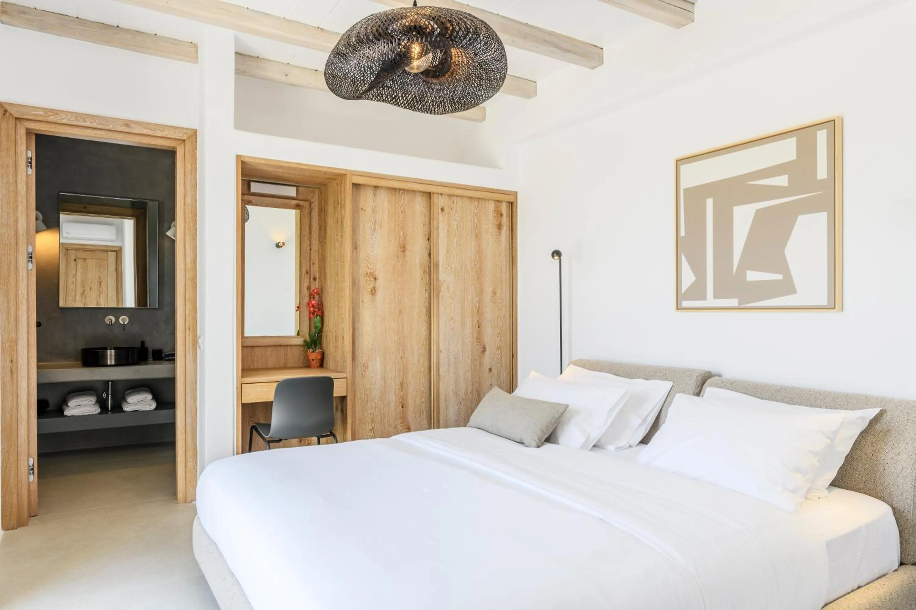 Bed in Nasta Suites & Villas Intentional Living Mykonos