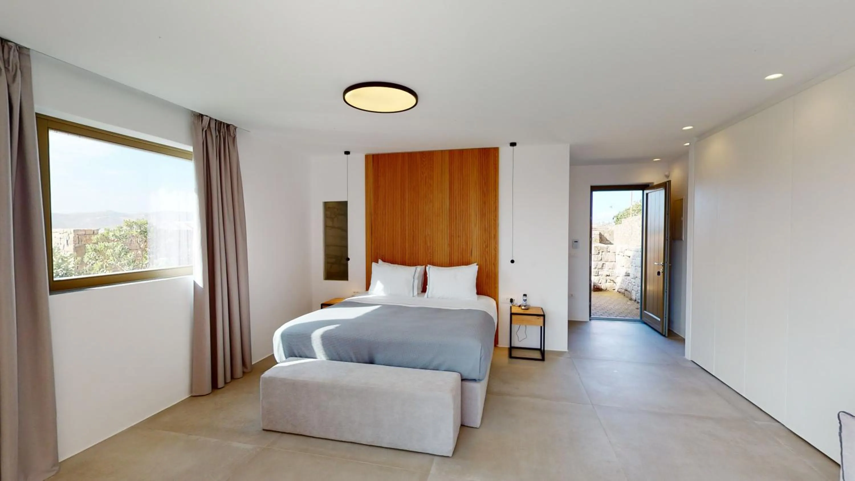 Bed in Nasta Suites & Villas Intentional Living Mykonos