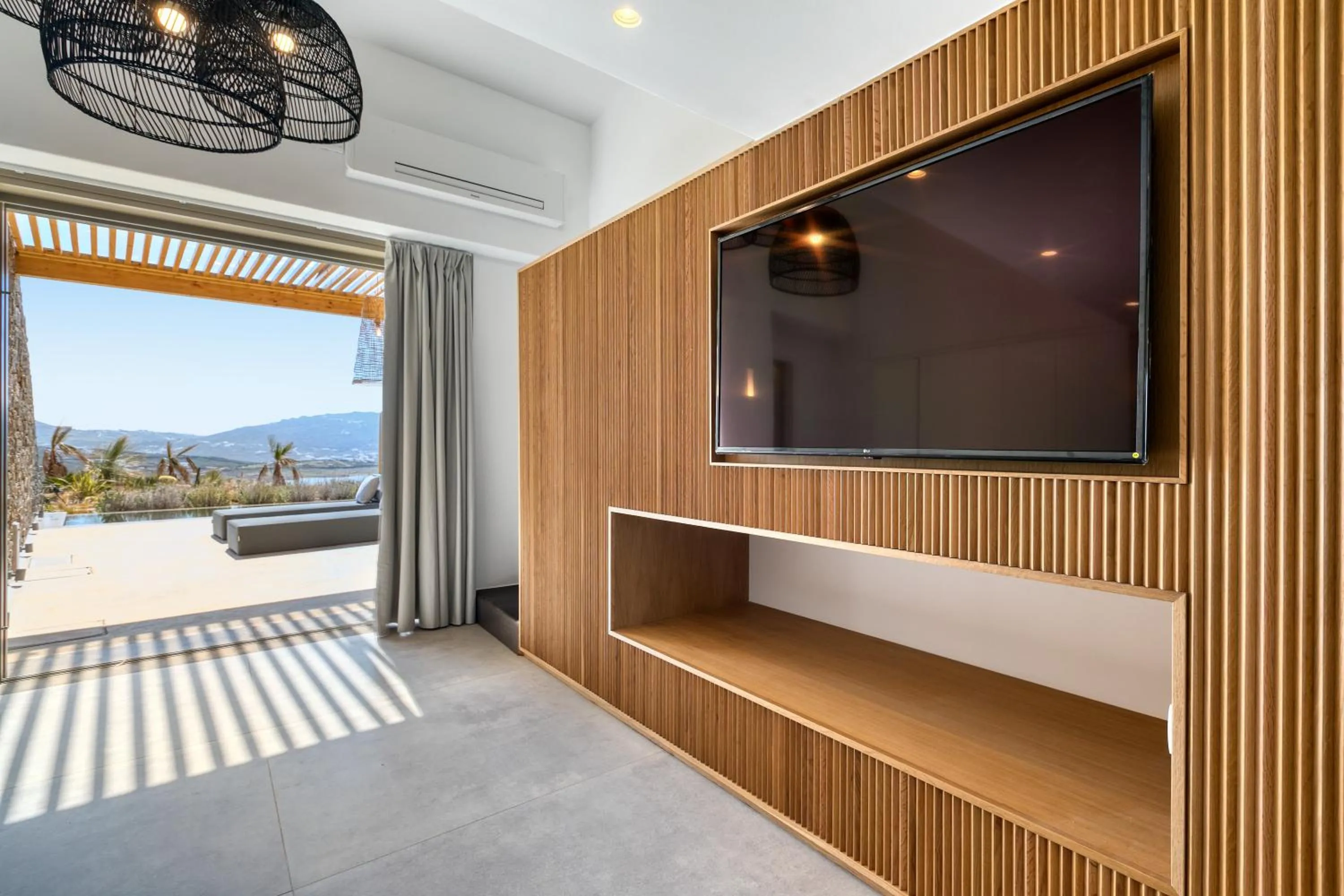 TV and multimedia in Nasta Suites & Villas Intentional Living Mykonos