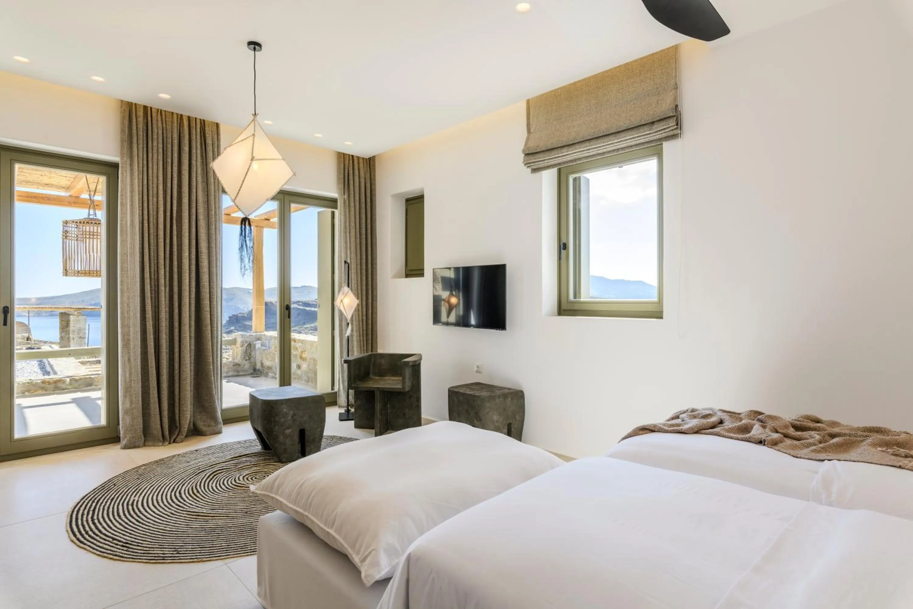 Bed in Nasta Suites & Villas Intentional Living Mykonos