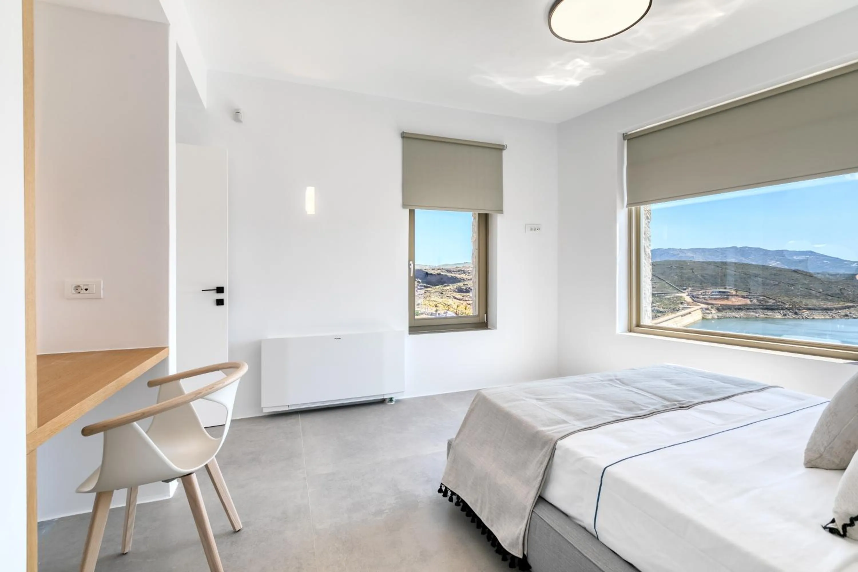 Bed in Nasta Suites & Villas Intentional Living Mykonos