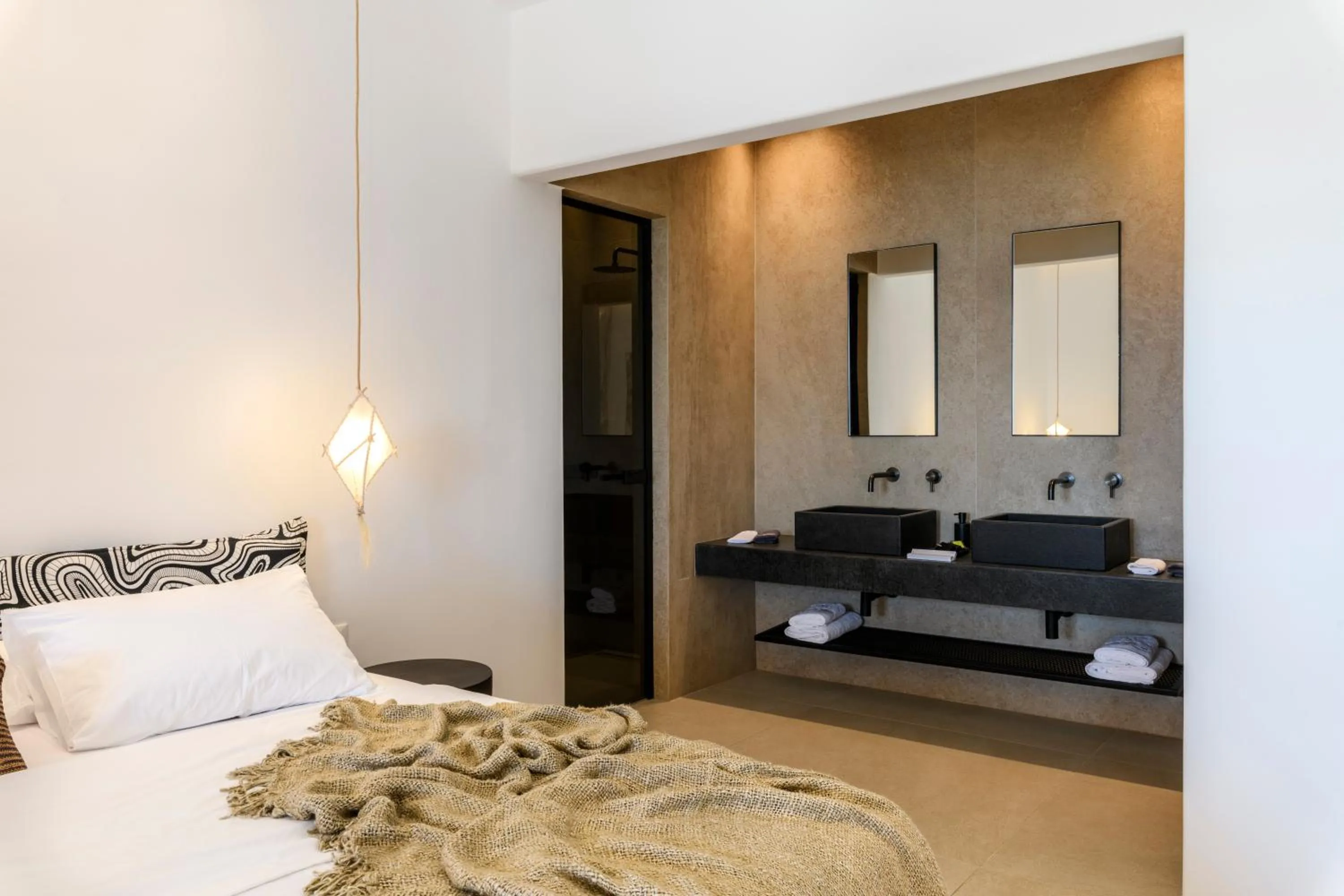 towels, Bed in Nasta Suites & Villas Intentional Living Mykonos
