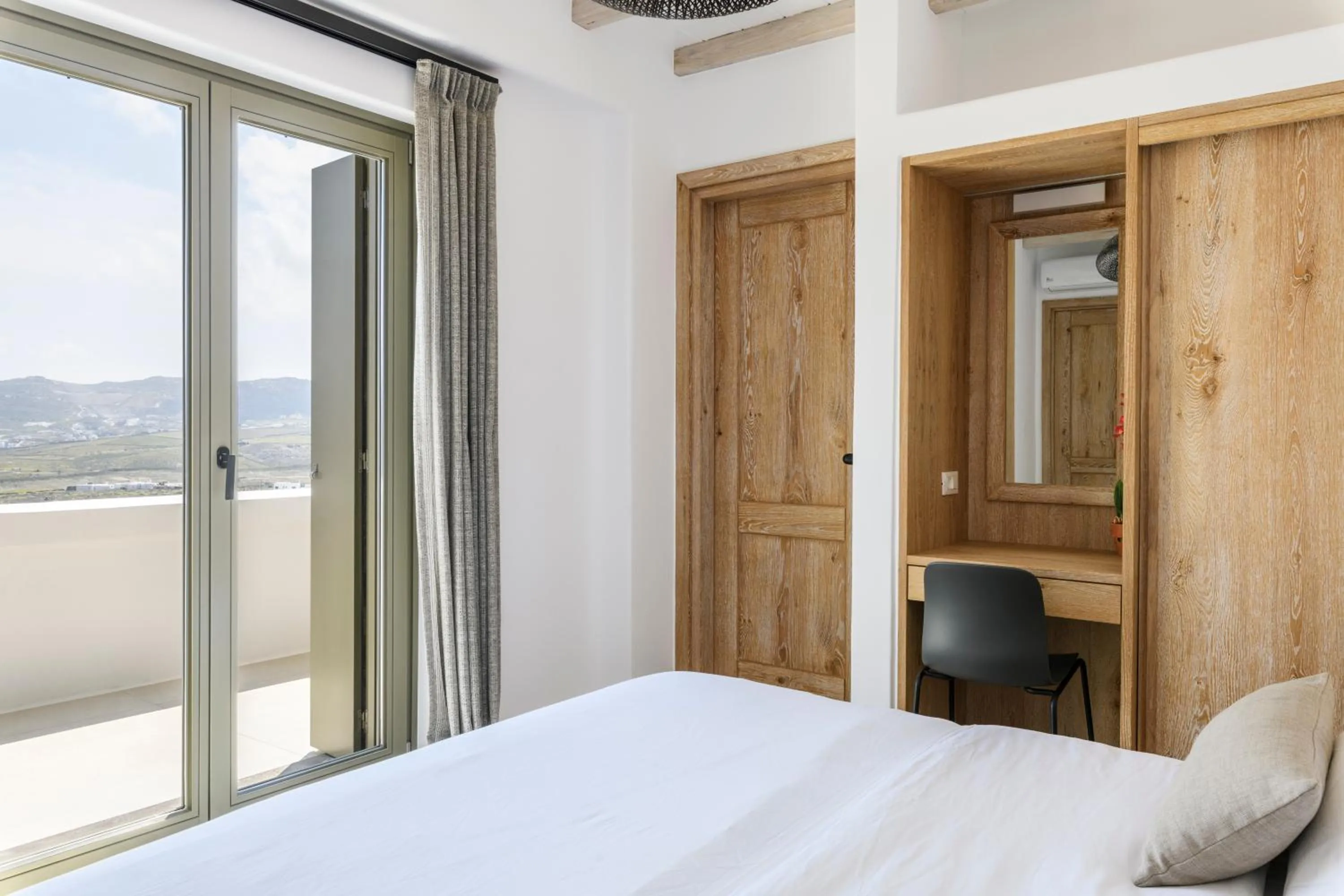 Bed in Nasta Suites & Villas Intentional Living Mykonos
