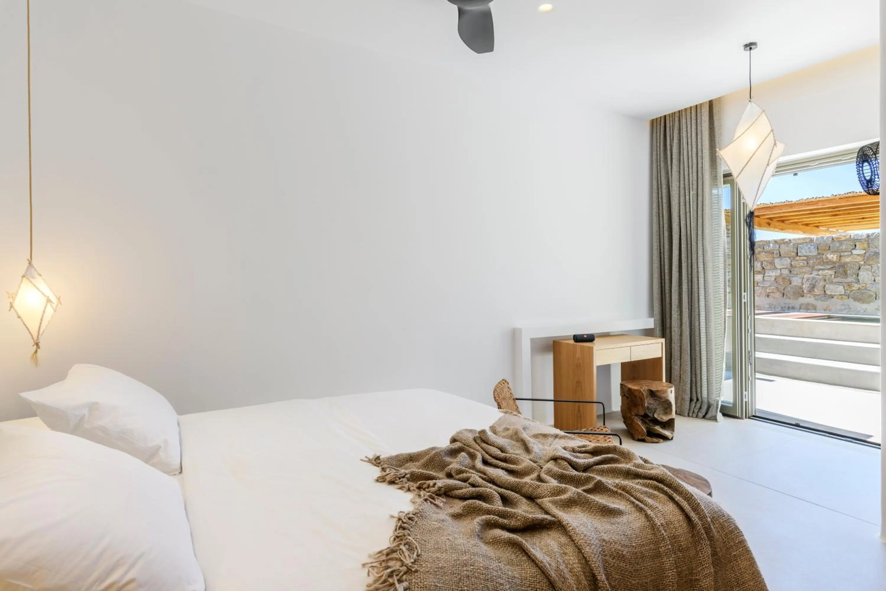 Bed in Nasta Suites & Villas Intentional Living Mykonos