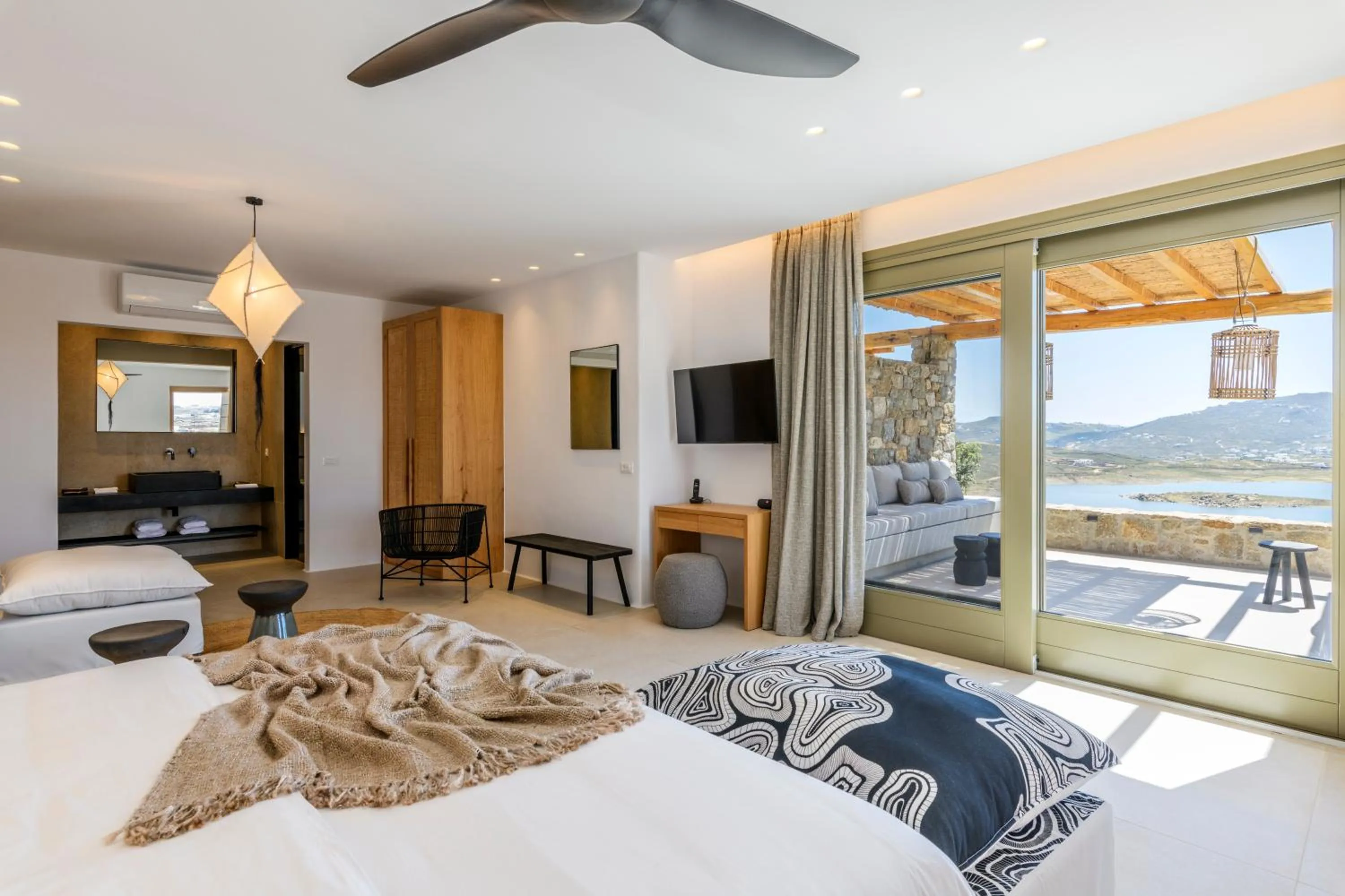 Bed in Nasta Suites & Villas Intentional Living Mykonos