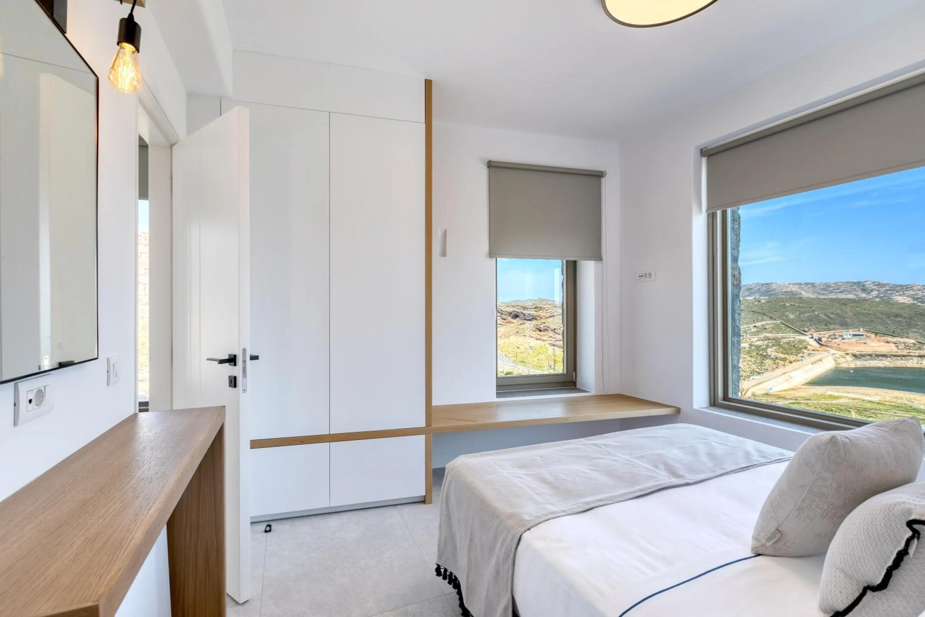 Bed in Nasta Suites & Villas Intentional Living Mykonos