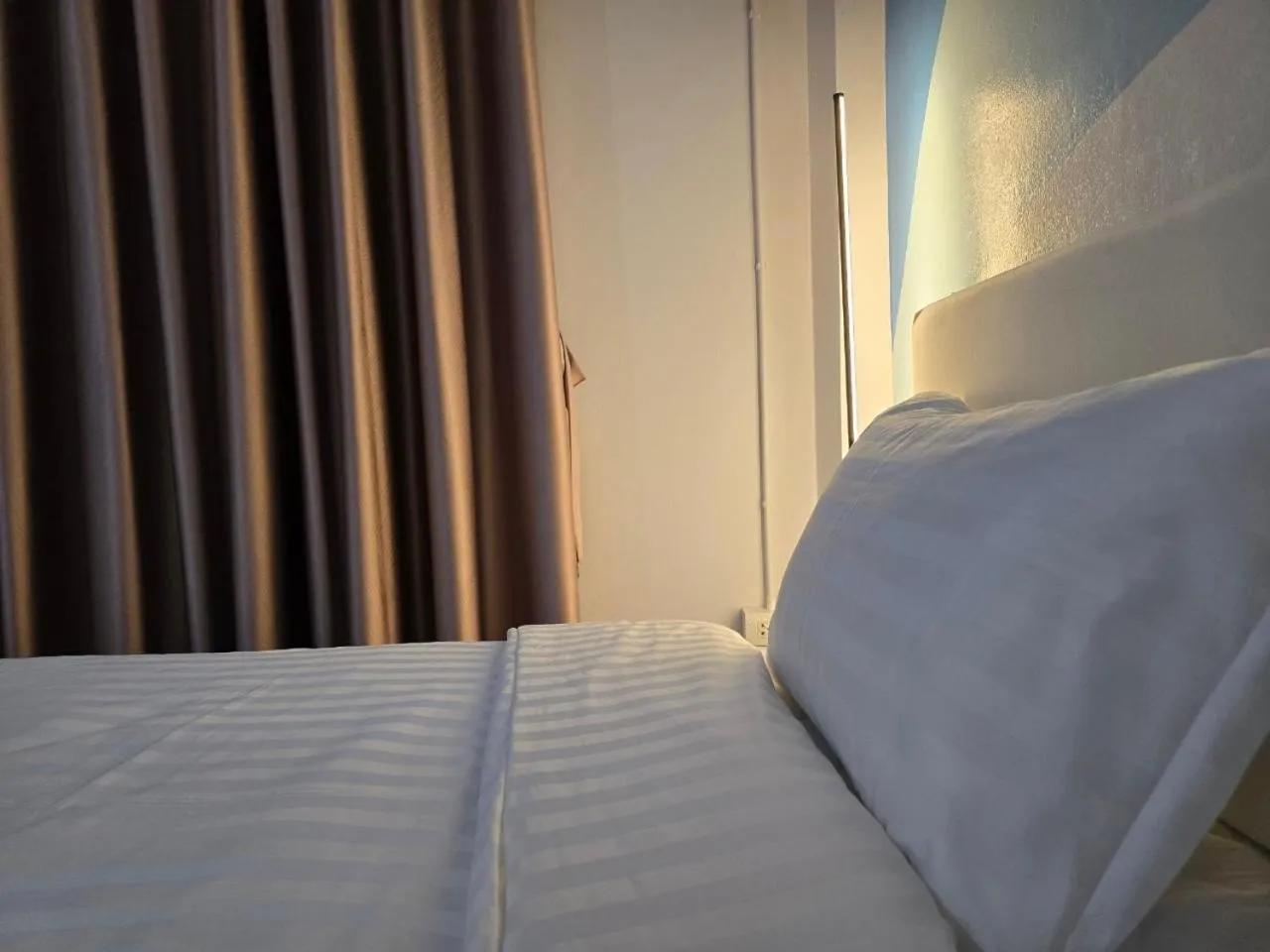 Bed in SRINN Hotel Pattaya Klang