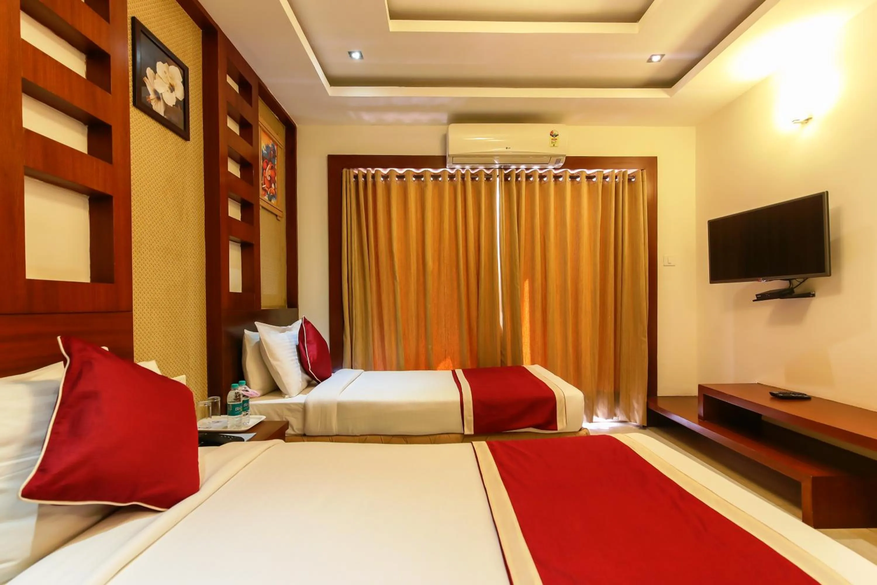 Living room, Bed in Icon Suites by Bhagini