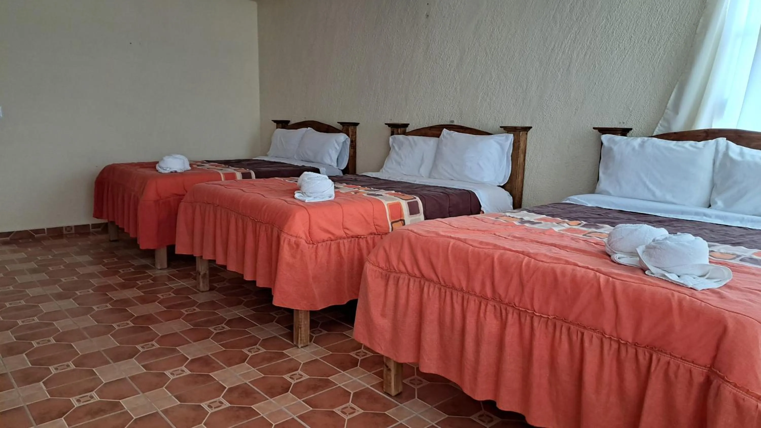 Bed in Hotel Renacer