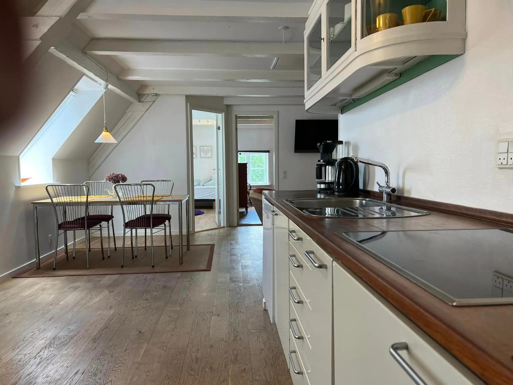 kitchen in Skovridergaardens Ferielejligheder
