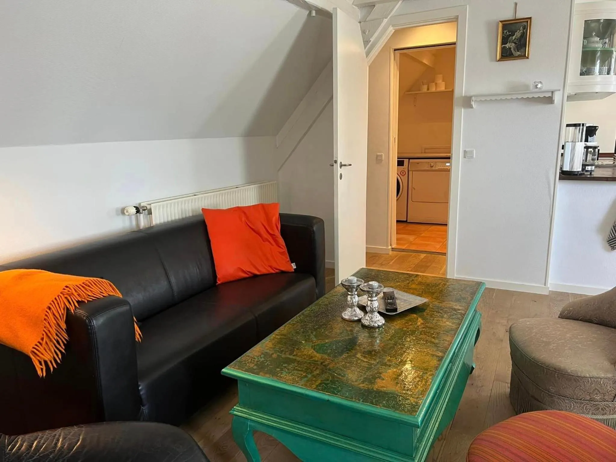 Communal lounge/ TV room in Skovridergaardens Ferielejligheder