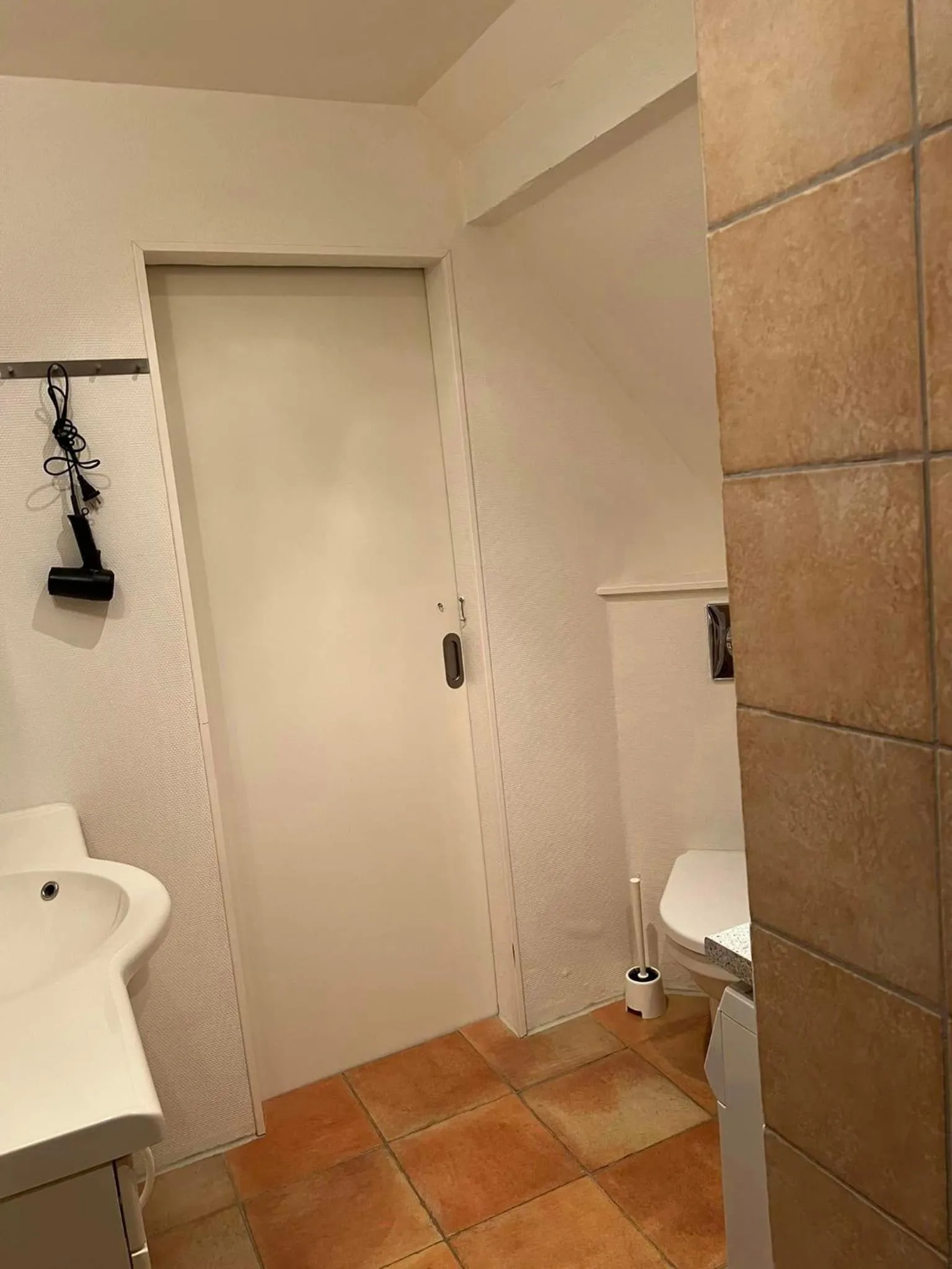 Bathroom in Skovridergaardens Ferielejligheder
