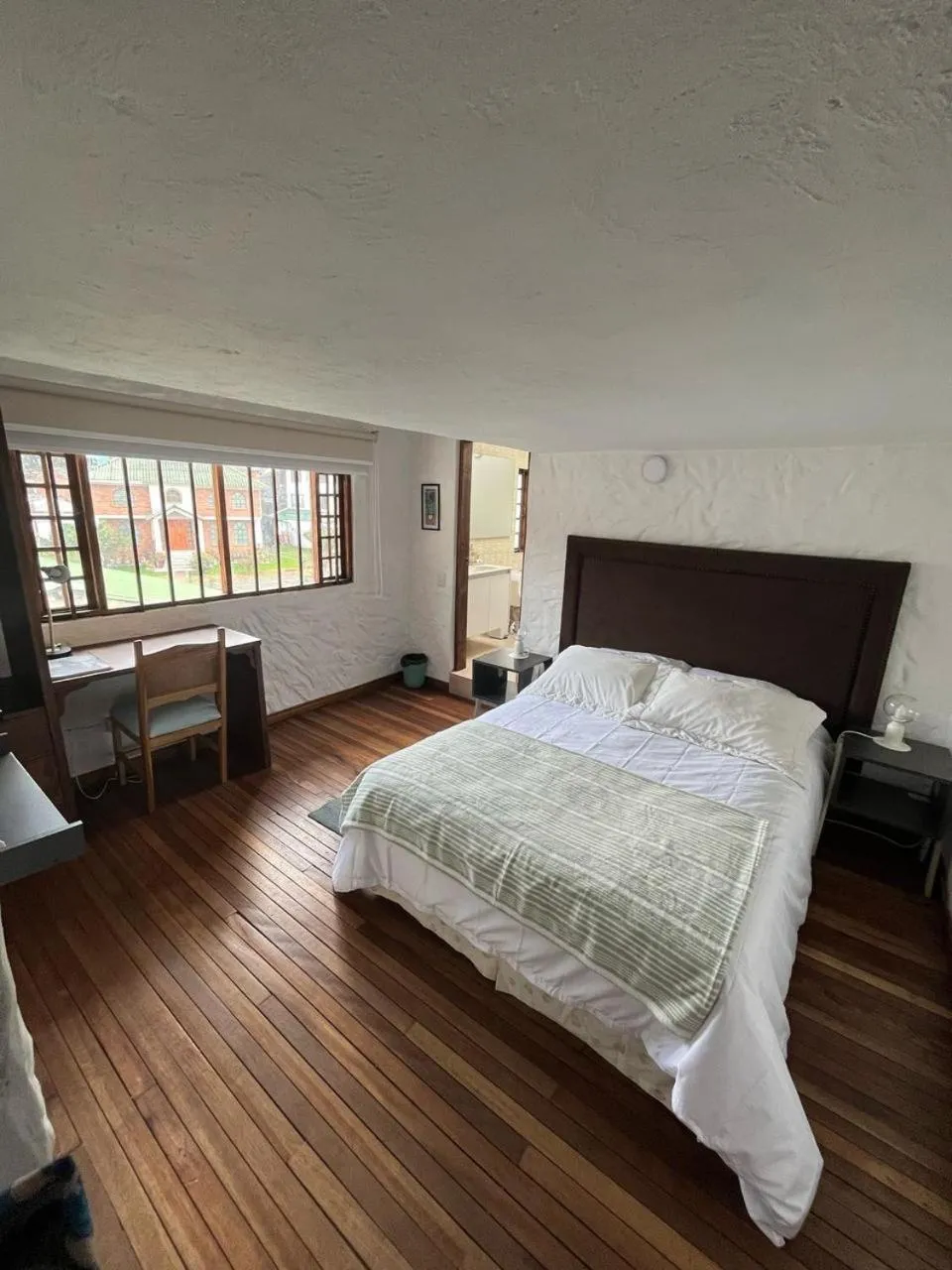 Bed in Blau Hotel&Café