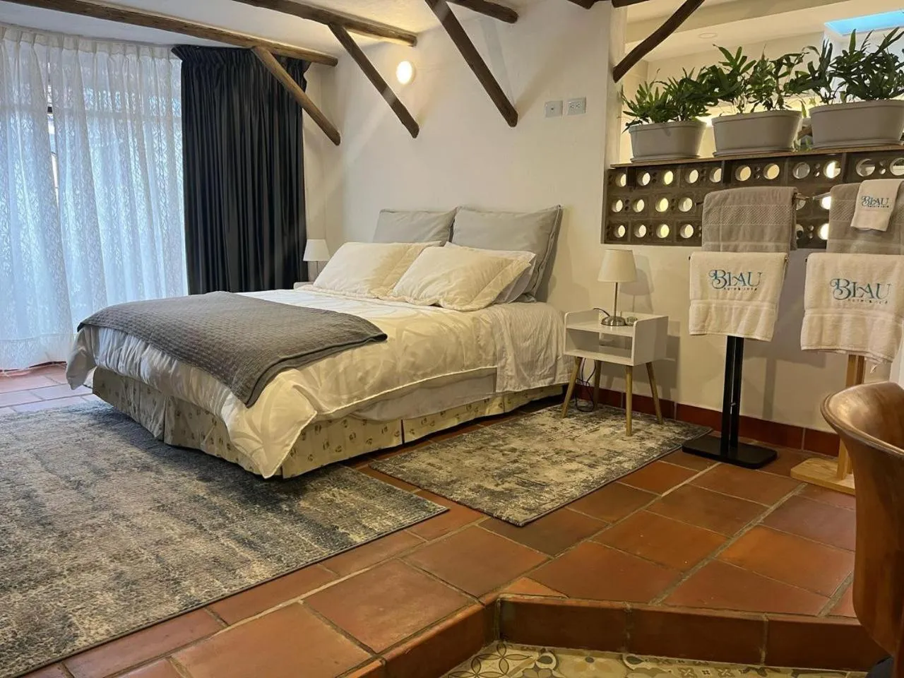 Bed in Blau Hotel&Café