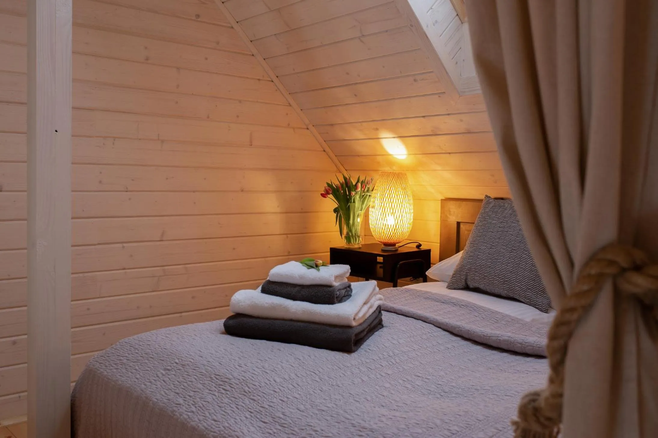 Bedroom in Sirvis Apartamenty