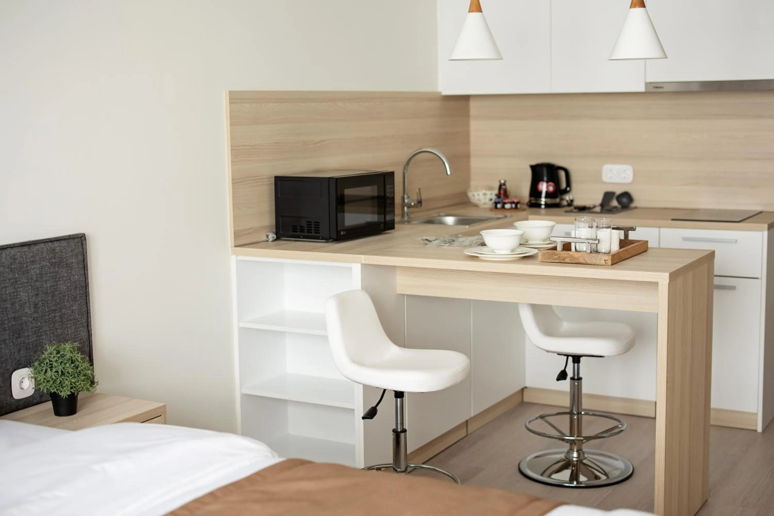 Kitchen or kitchenette, Bed in TOR'RE Astana, Trademark Collection by Wyndham