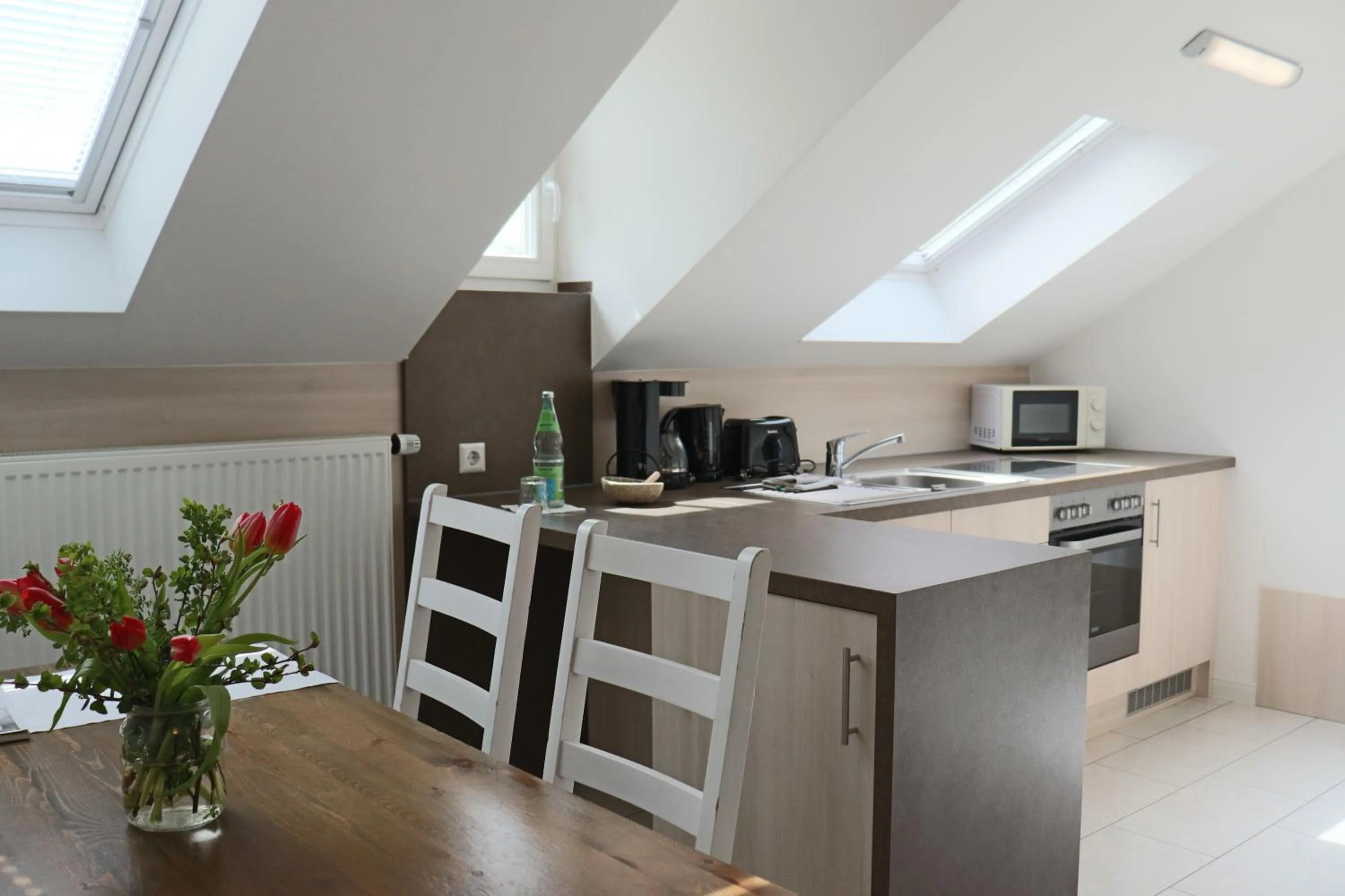 Kitchen or kitchenette in Gästehaus "Unsere Stadtvilla" Hechingen