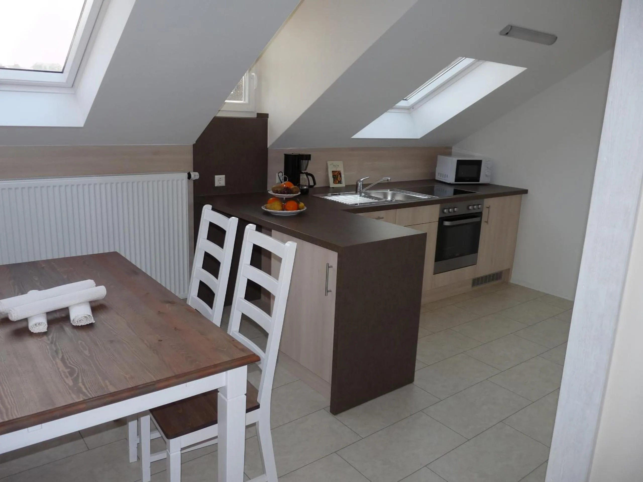 Kitchen or kitchenette in Gästehaus "Unsere Stadtvilla" Hechingen