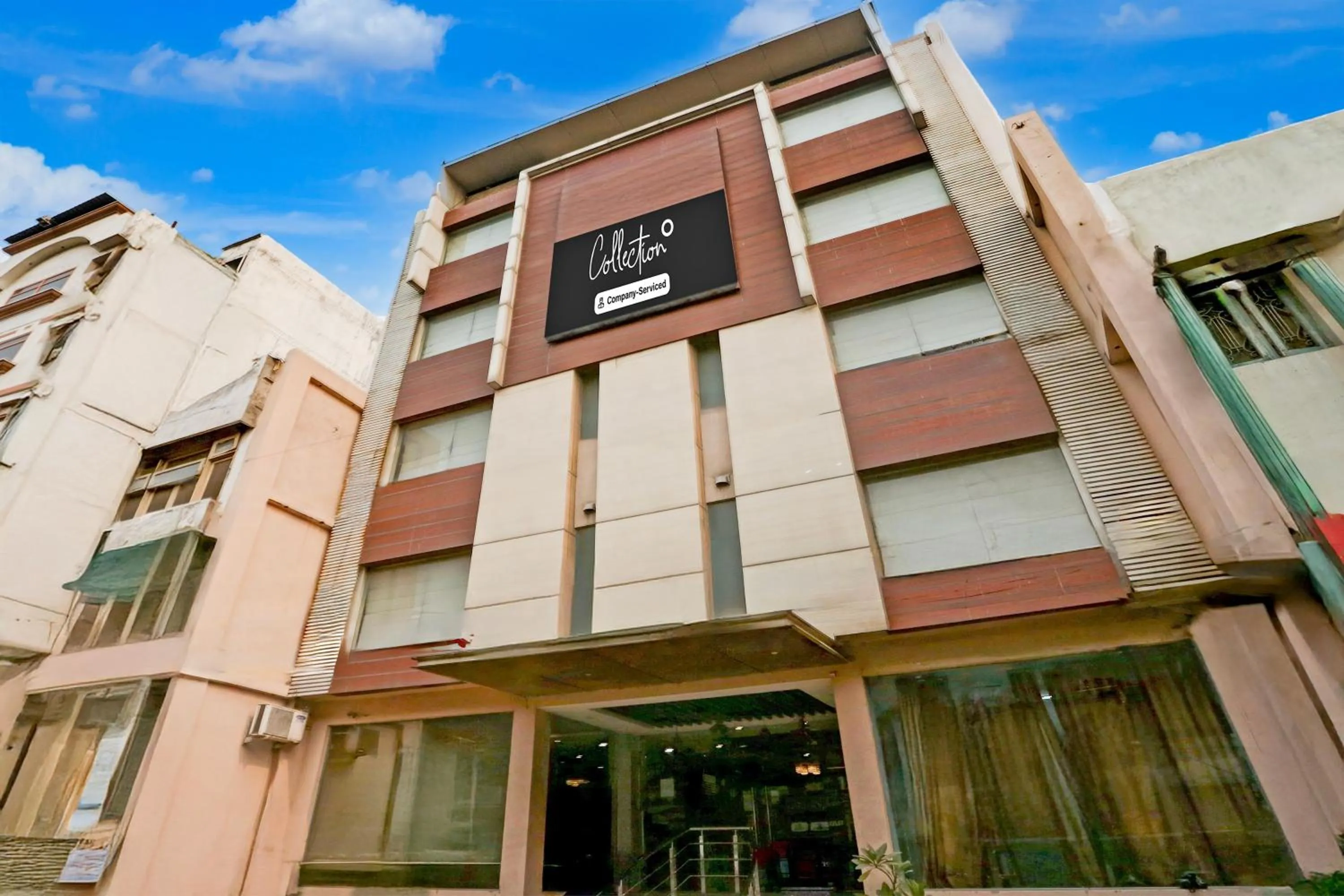 Facade/entrance in Super Collection O Railway Station Road Near Clock Tower