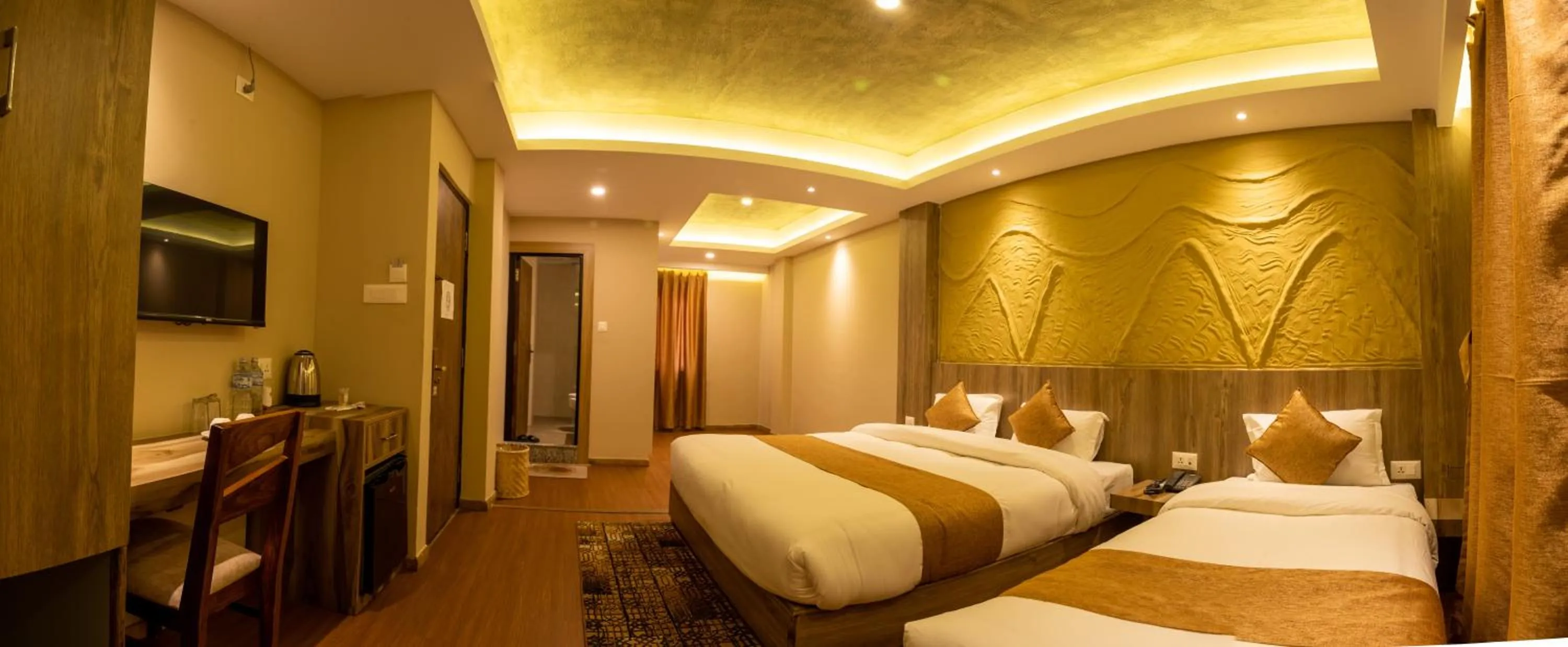 Bed in Divya Boutique Inn