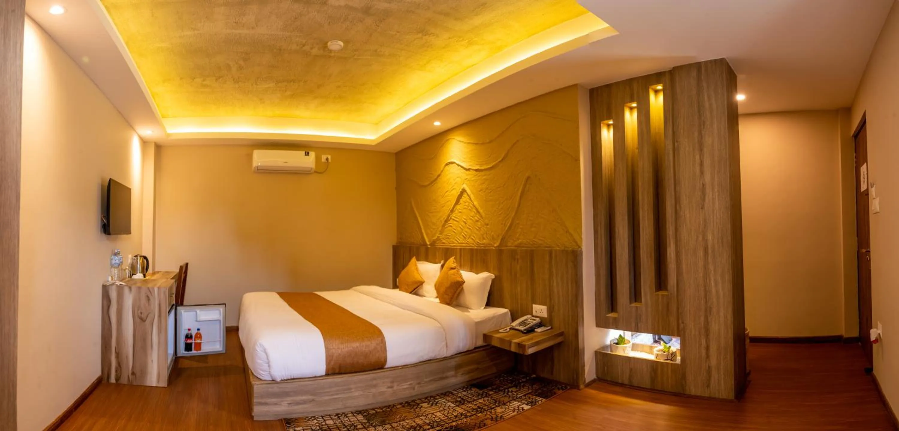 Bed in Divya Boutique Inn
