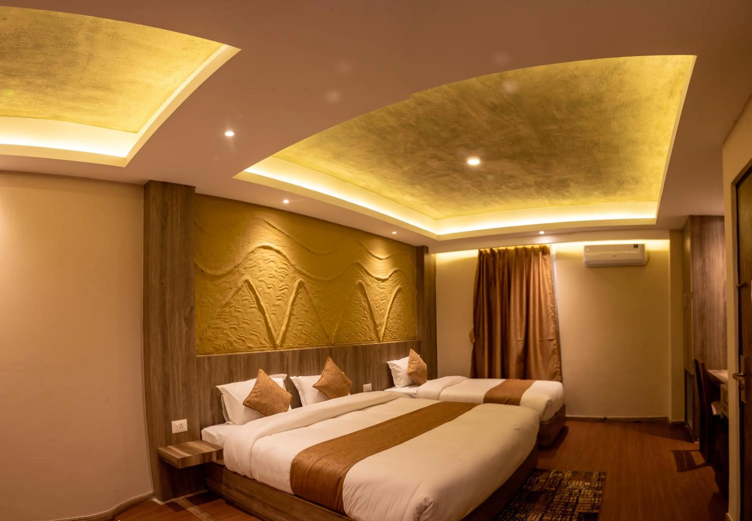 Bed in Divya Boutique Inn