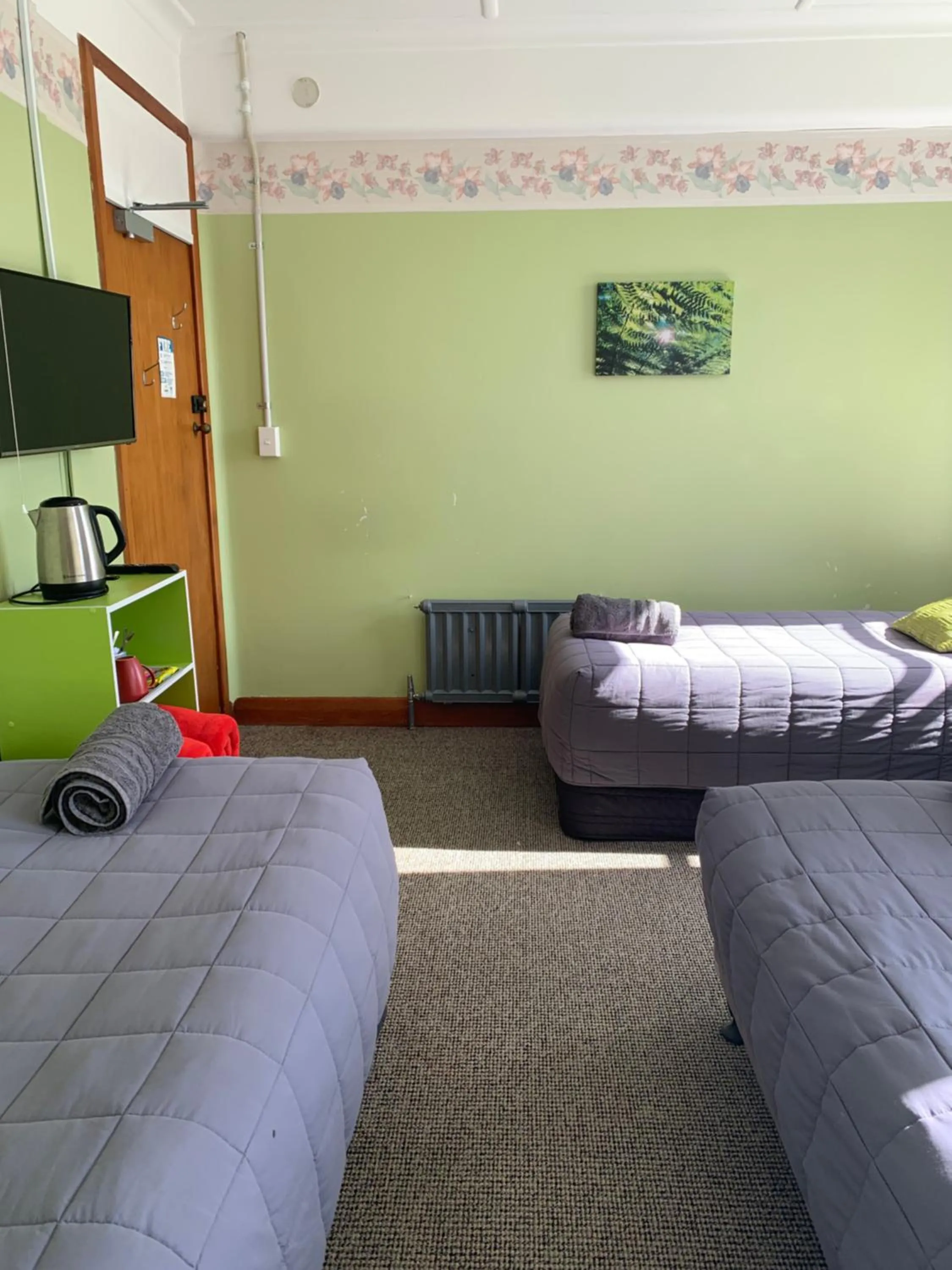 Bed in Thomas's Catlins Lodge and Camp Ground