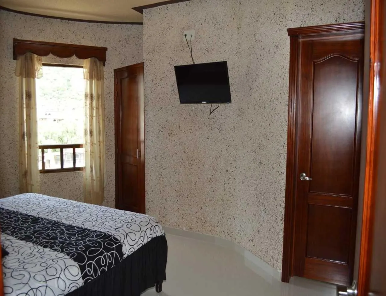 Photo of the whole room, Bed in Hotel Guadalupe Bernal