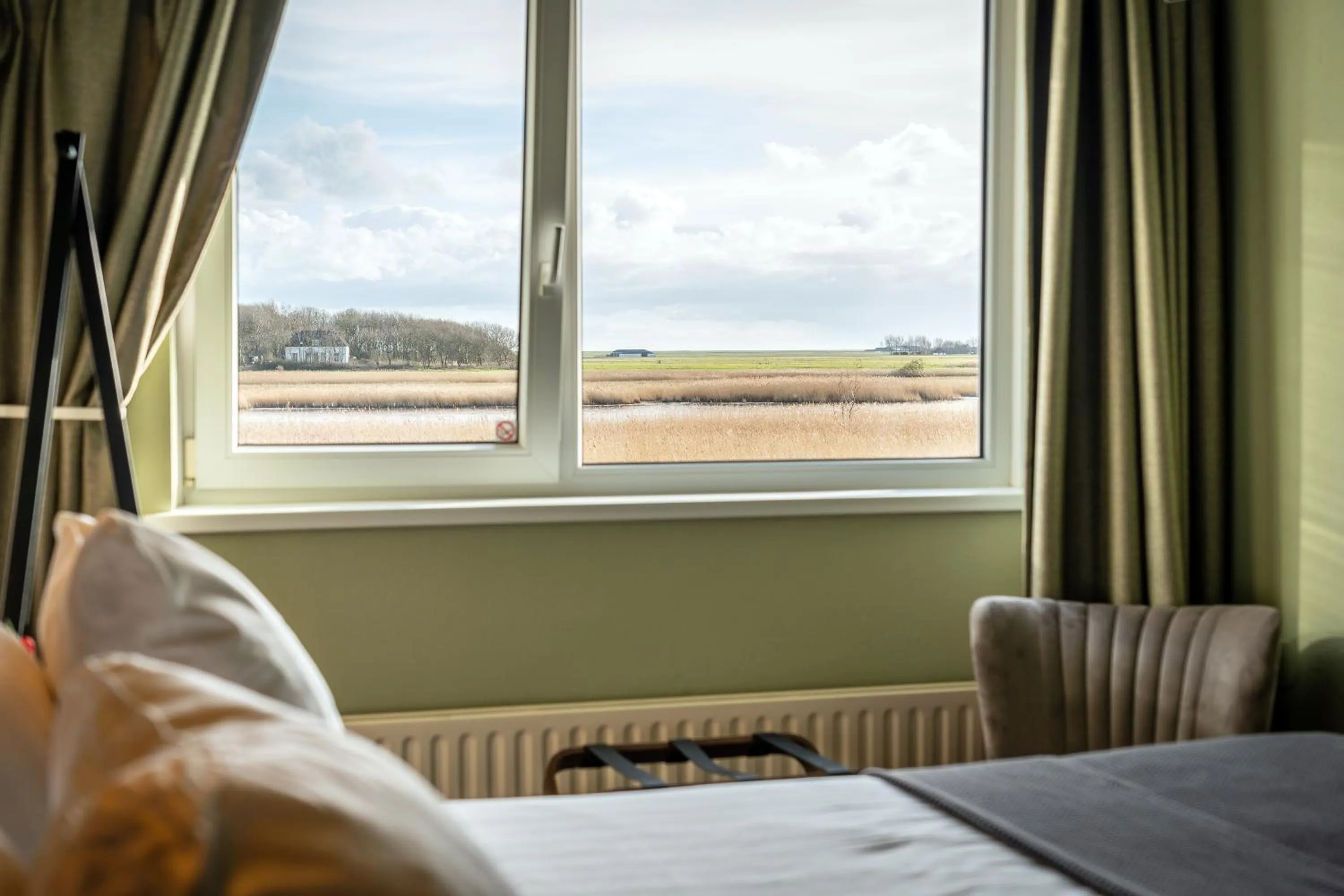 View (from property/room), Bed in Hotel het Anker van Texel