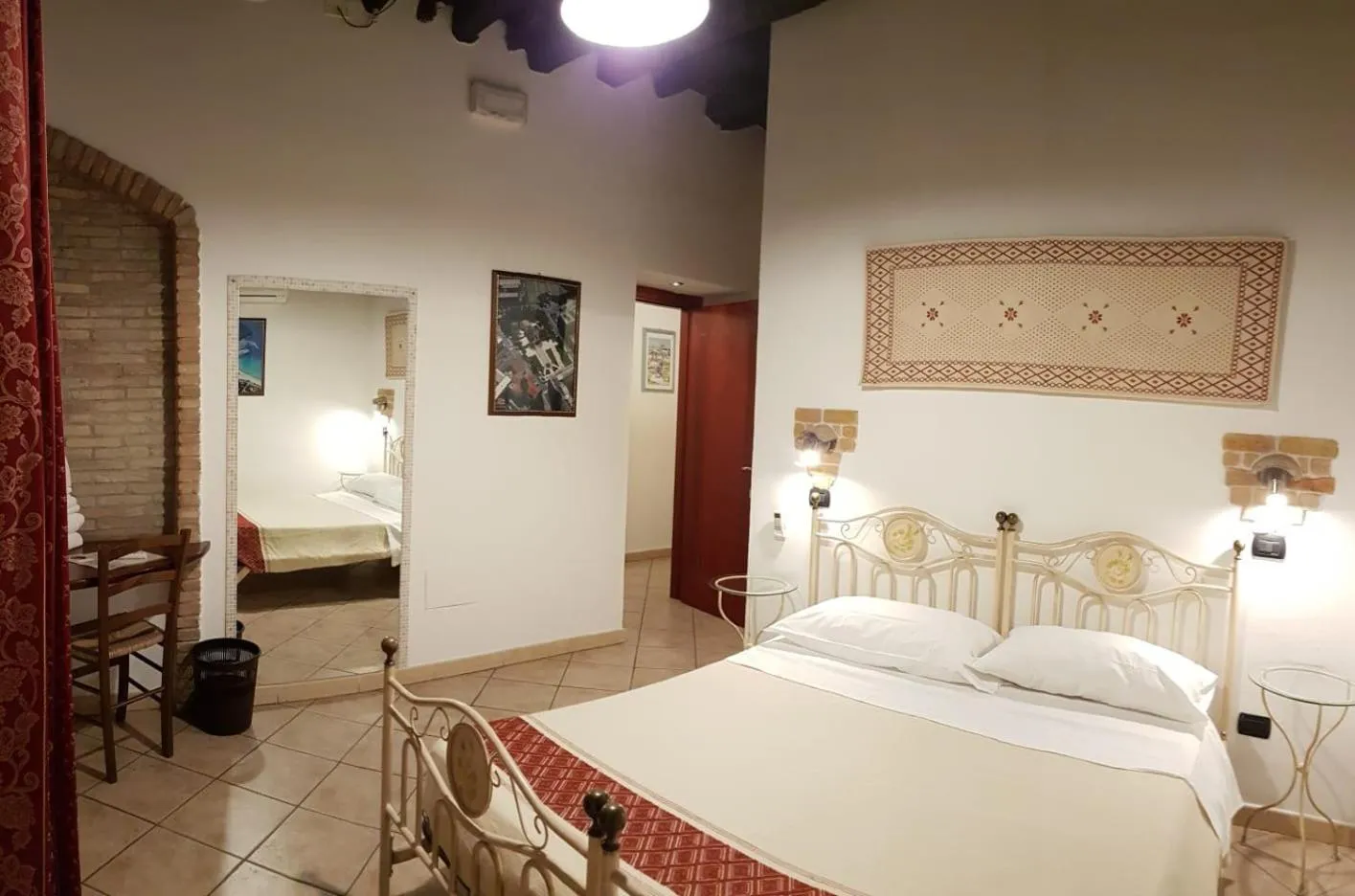 Photo of the whole room, Bed in Sardinia Domus