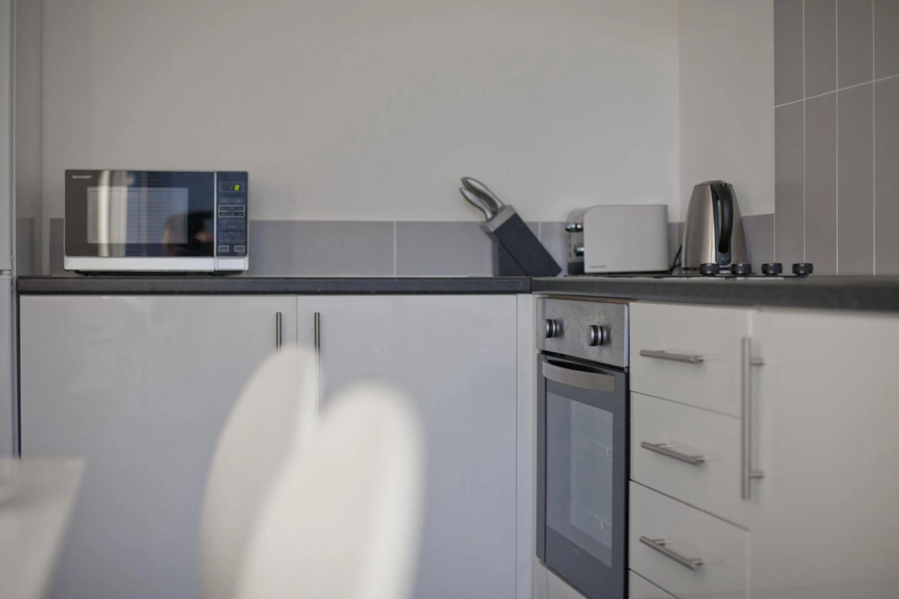 Kitchen or kitchenette in Aberdeen Serviced Apartments: Charlotte street