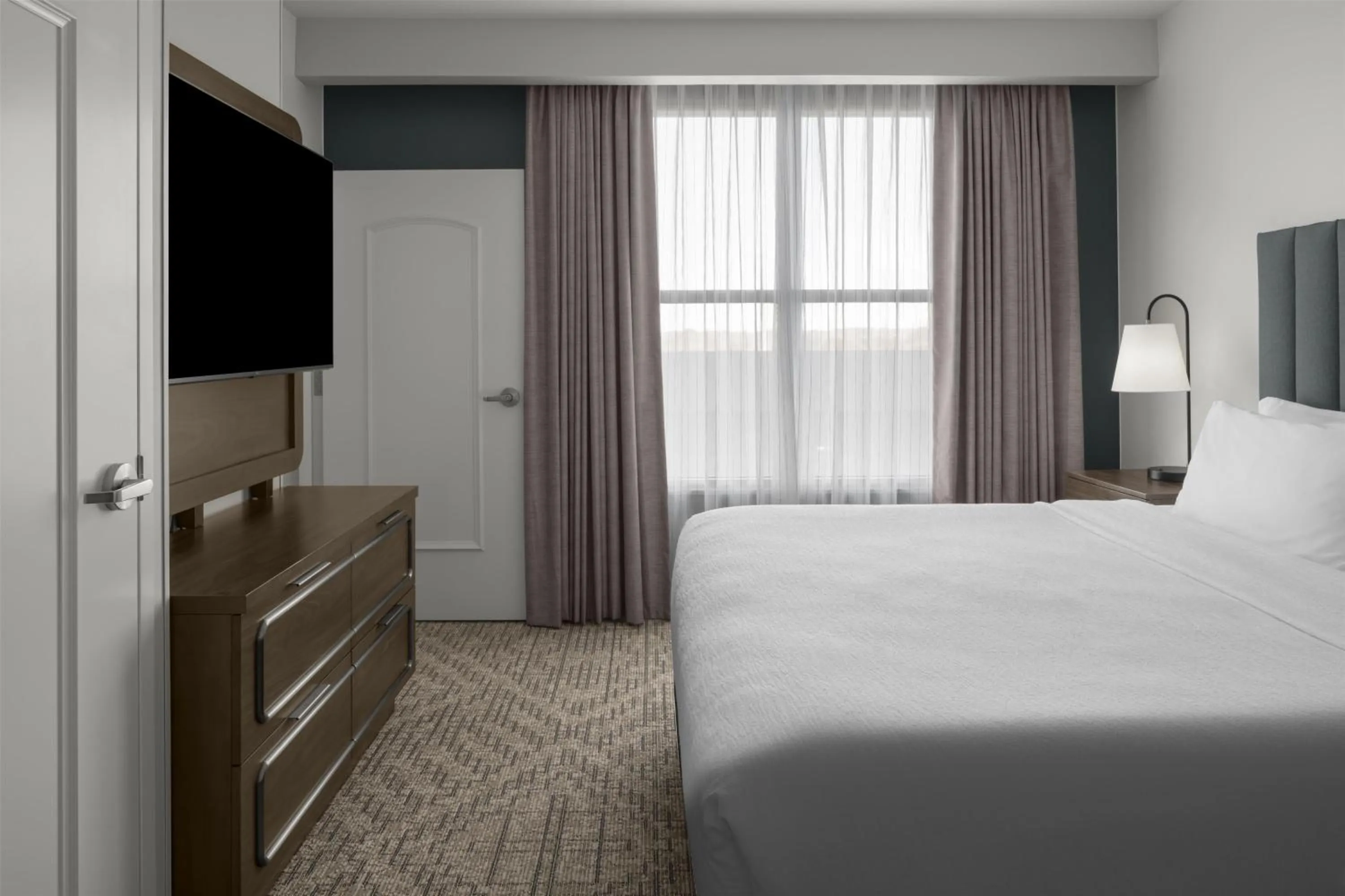 Bed in Embassy Suites by Hilton Tuscaloosa Alabama Downtown