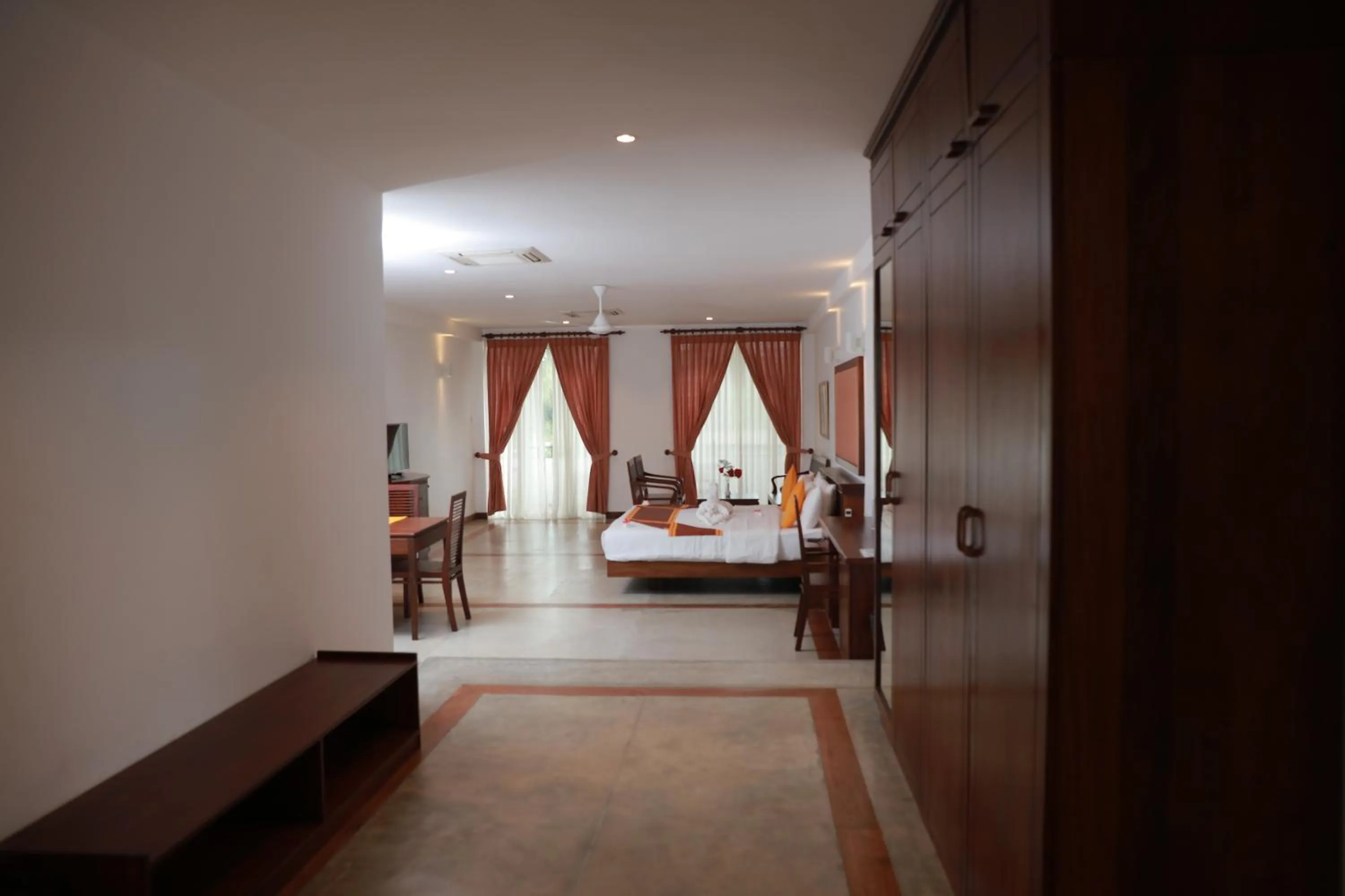 Living room, Bed in Refresh Hotel Hikkaduwa