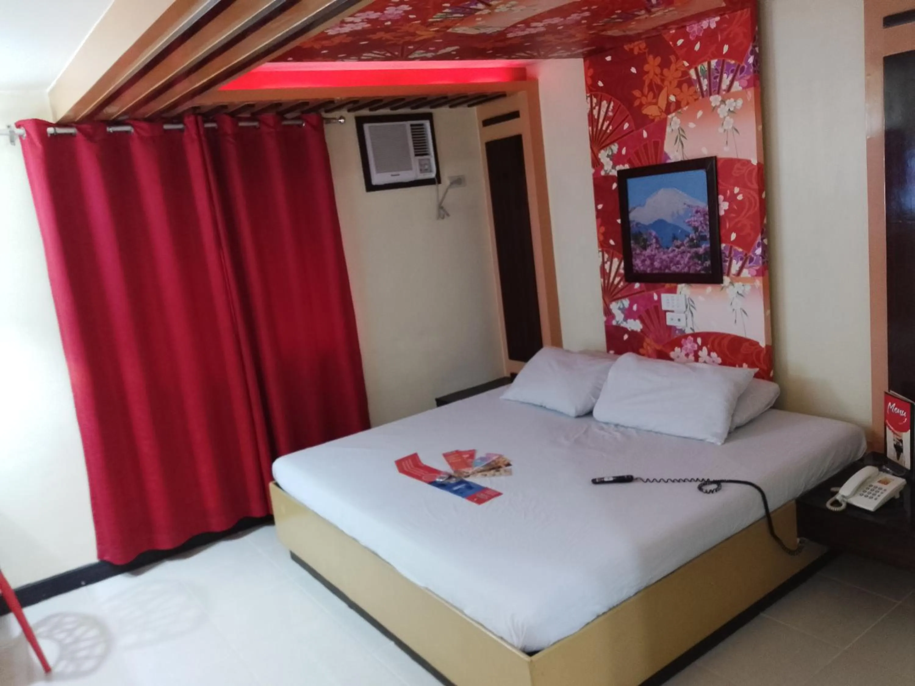 Photo of the whole room, Bed in Hotel Sogo - EDSA, Pasay Harrison