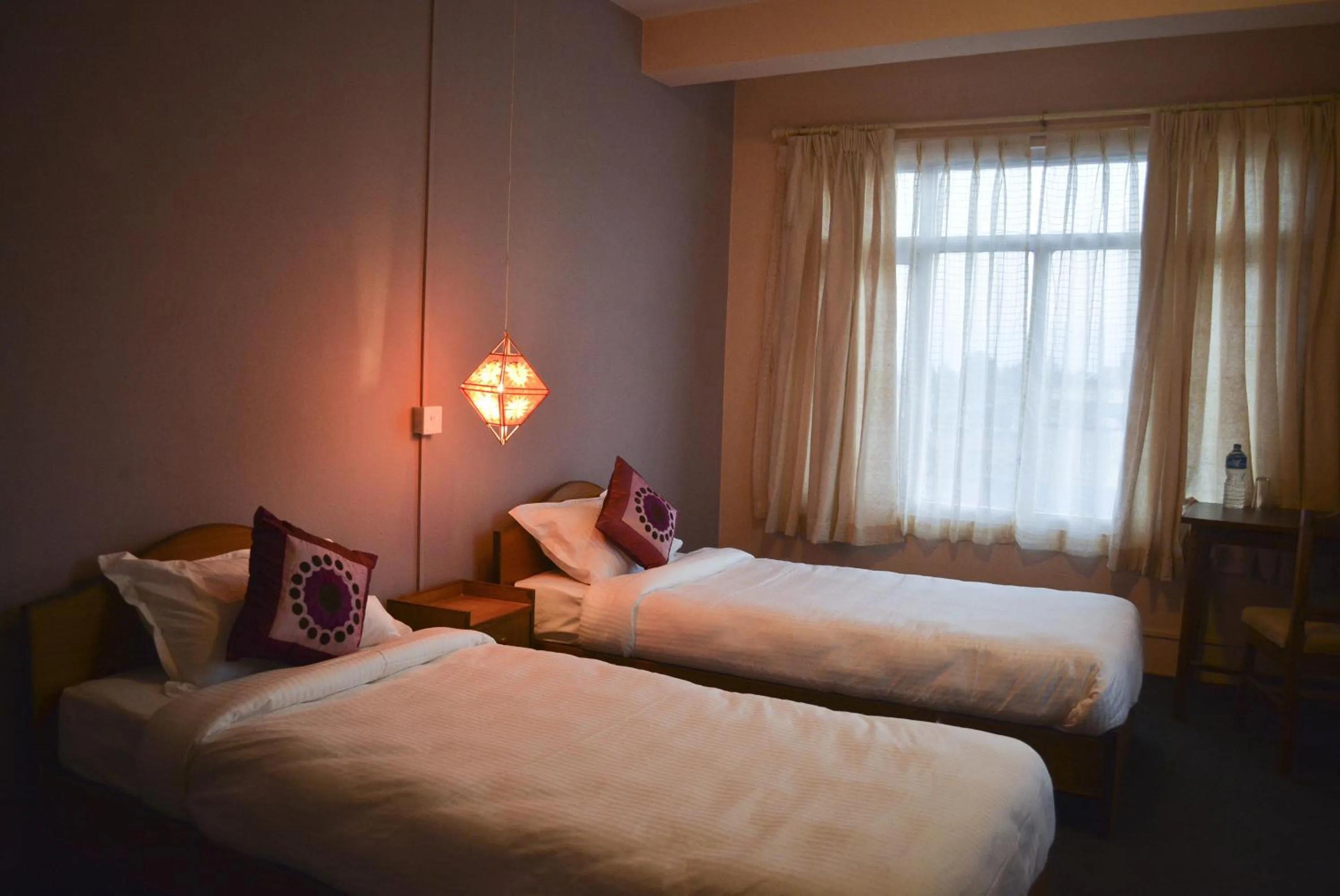 Bed in Bodhi Guest House