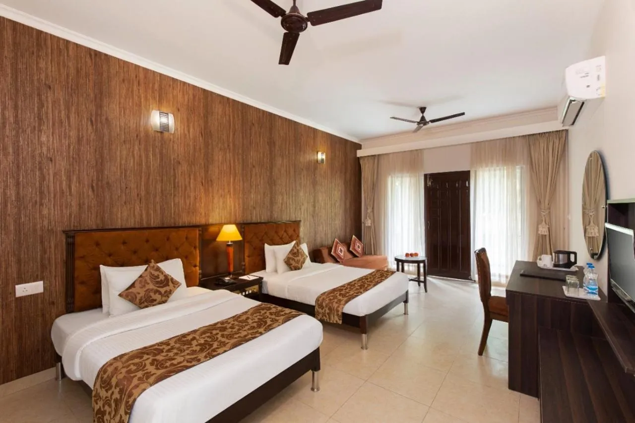 Bed in Click Resort Corbett Tiger Den