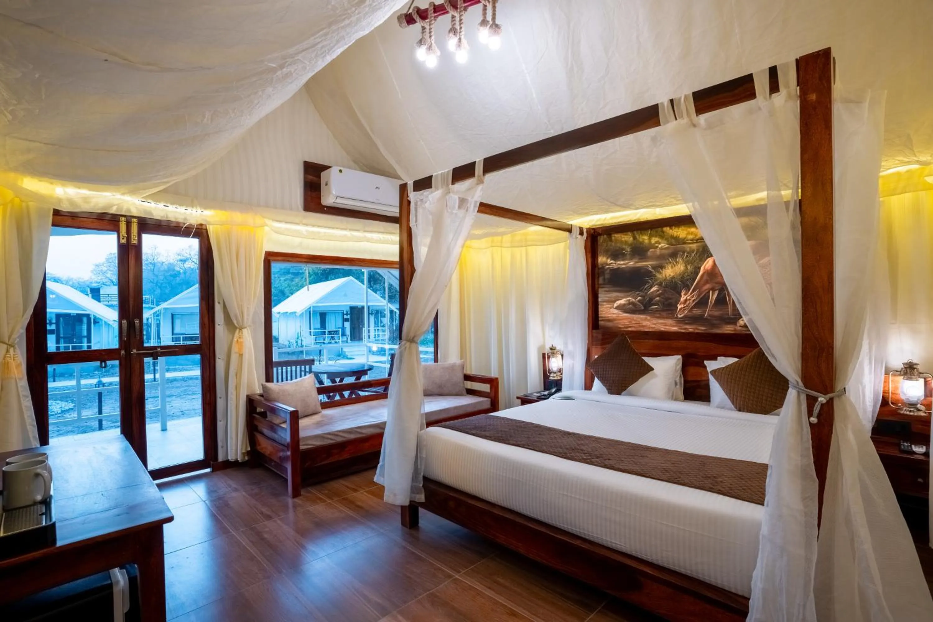 Bed in Click Resort Corbett Tiger Den