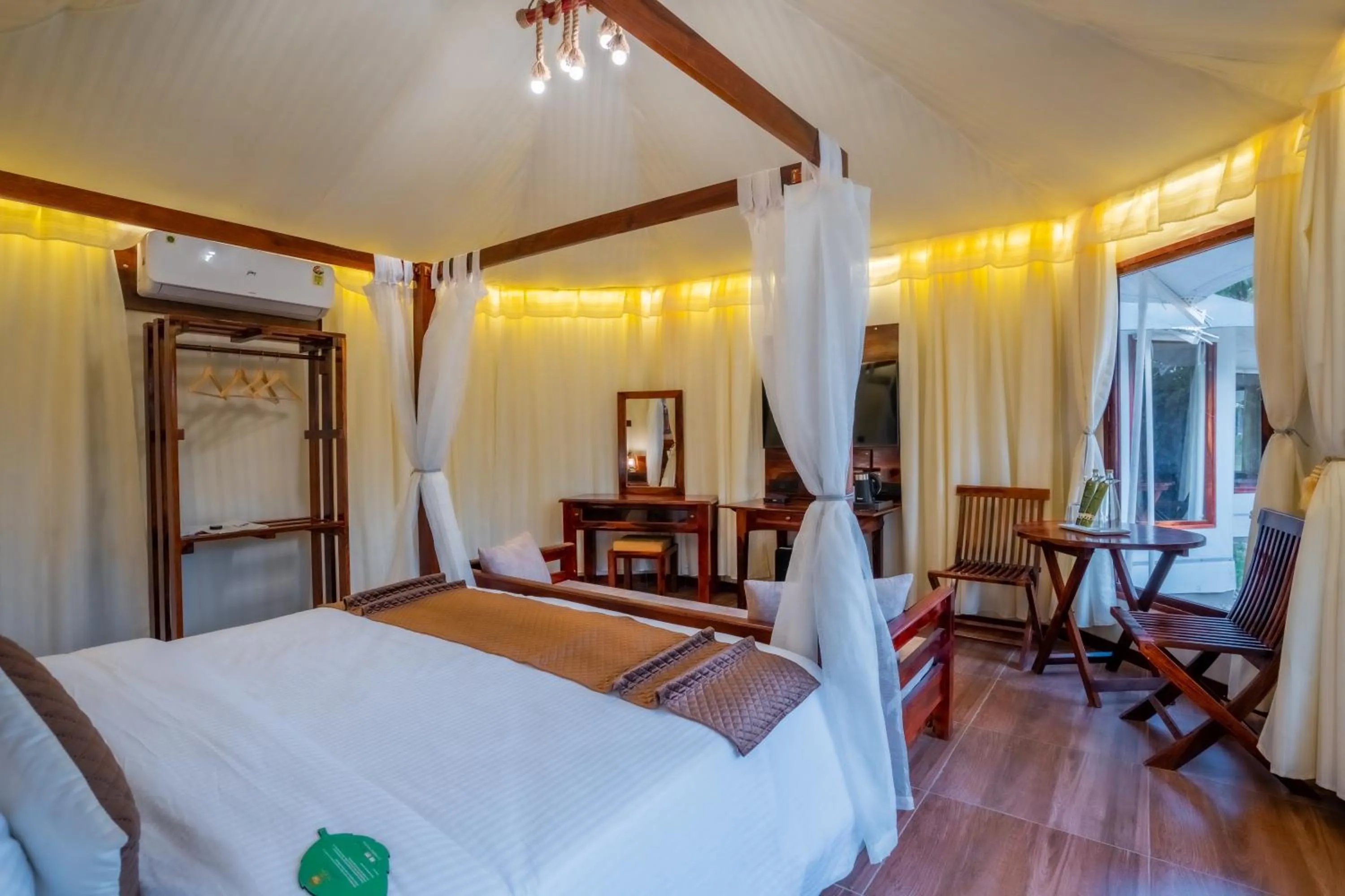 Bed in Click Resort Corbett Tiger Den