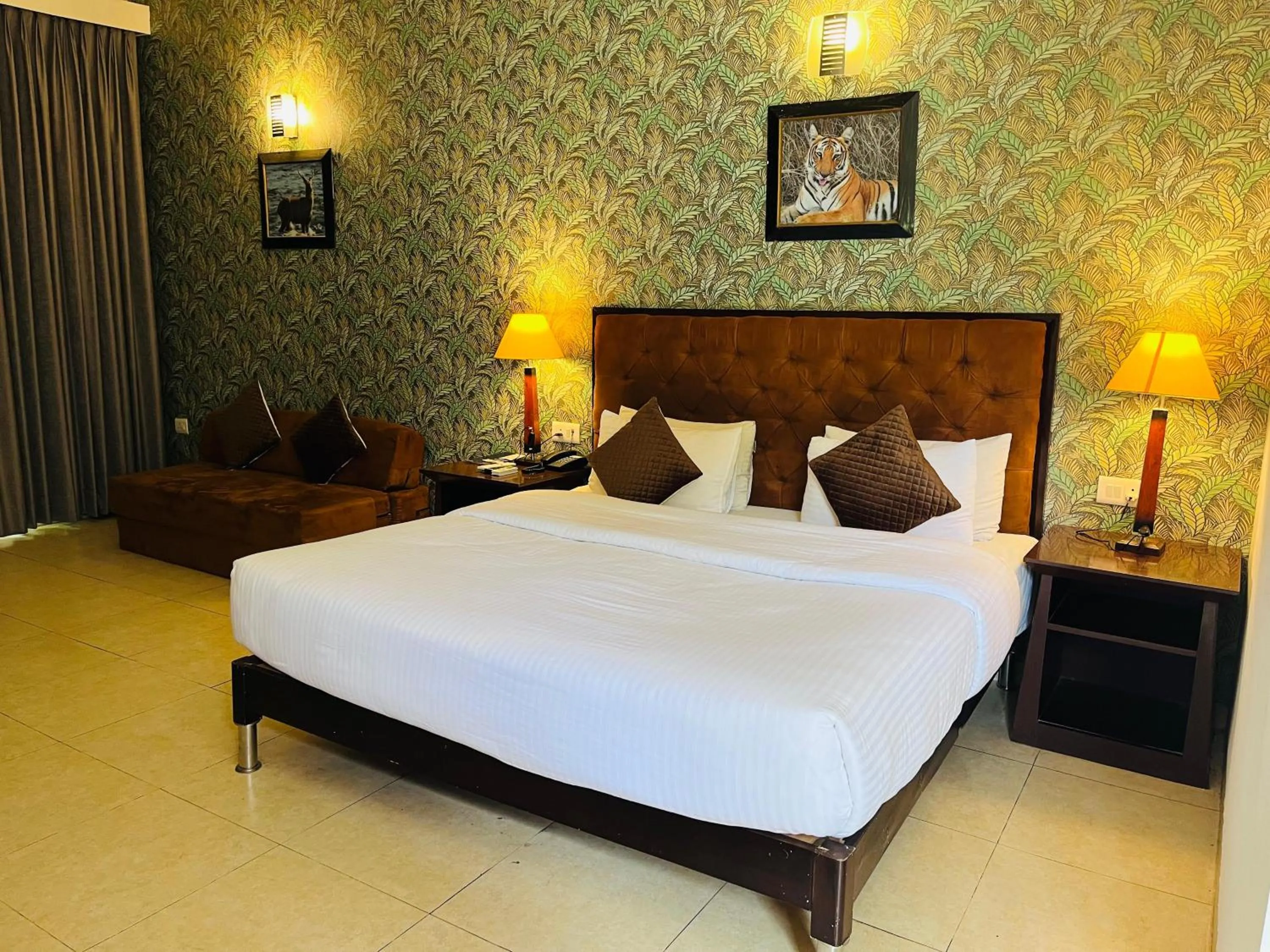 Bed in Click Resort Corbett Tiger Den