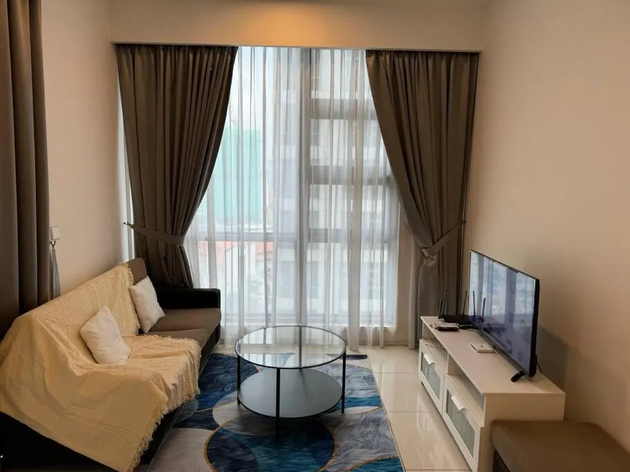 Living room, Bed in The Robertson Bukit Bintang by DeUrban