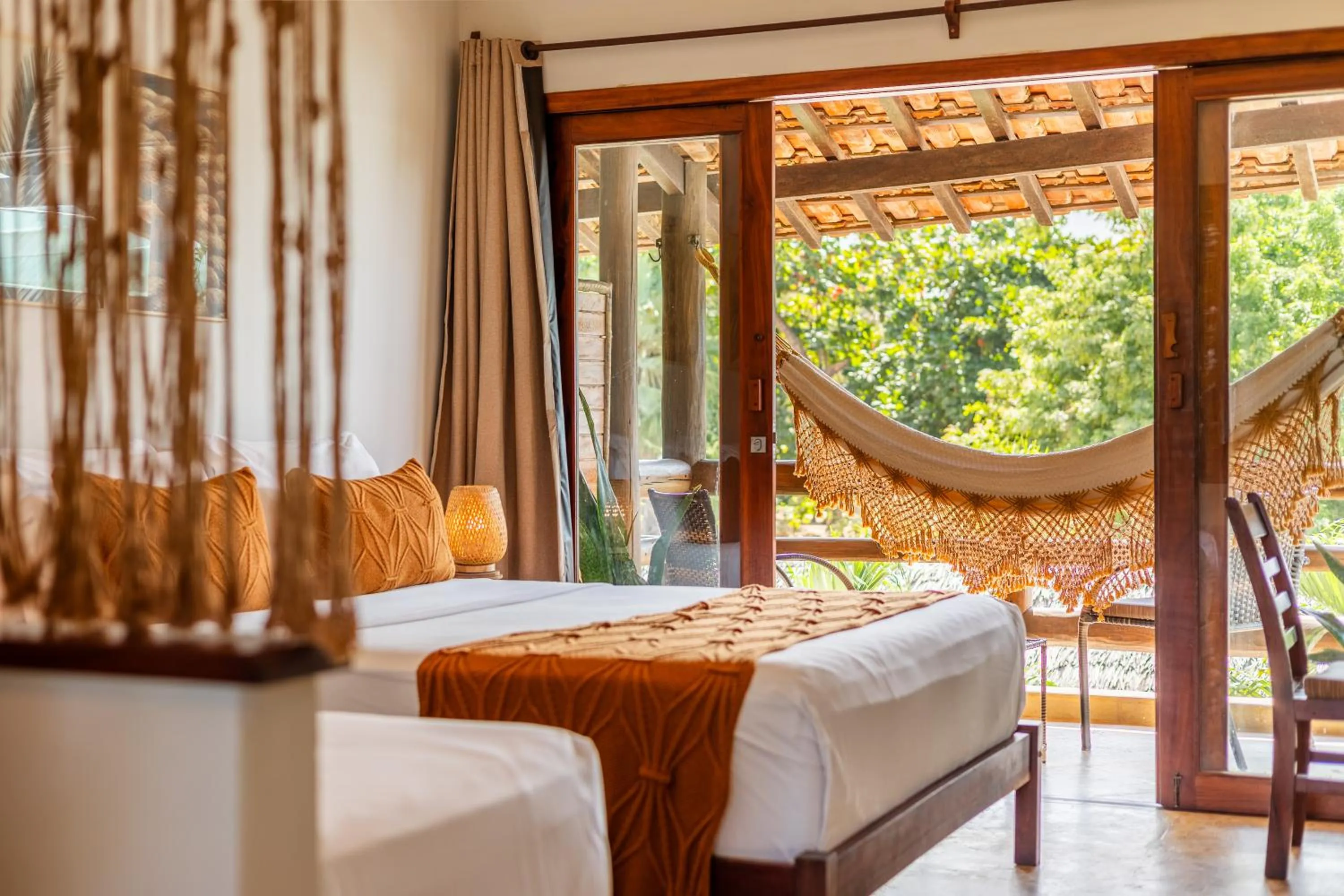 Bed in Pousada Carcará