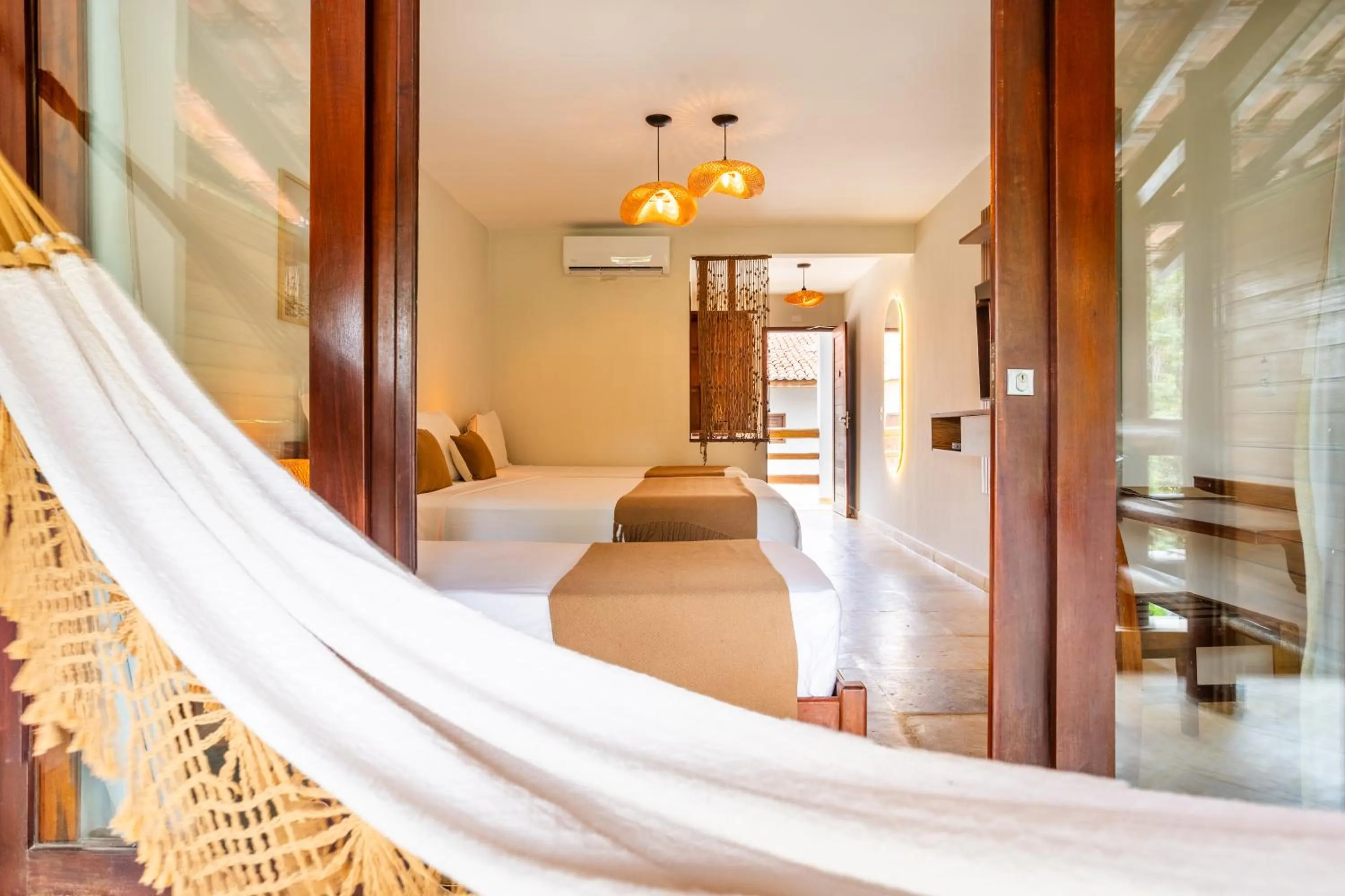 Bed in Pousada Carcará