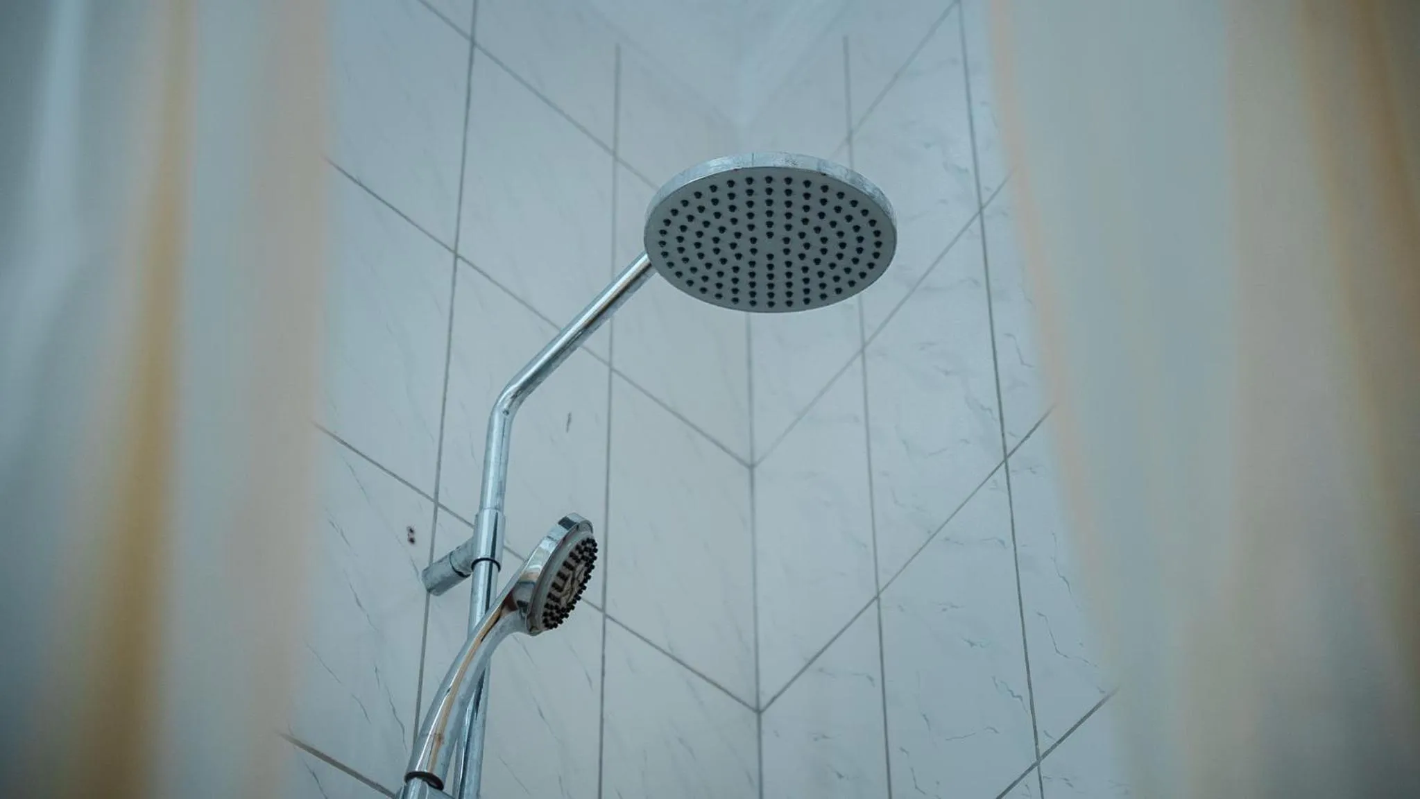 Shower in Quality Inn Hotel Kigali