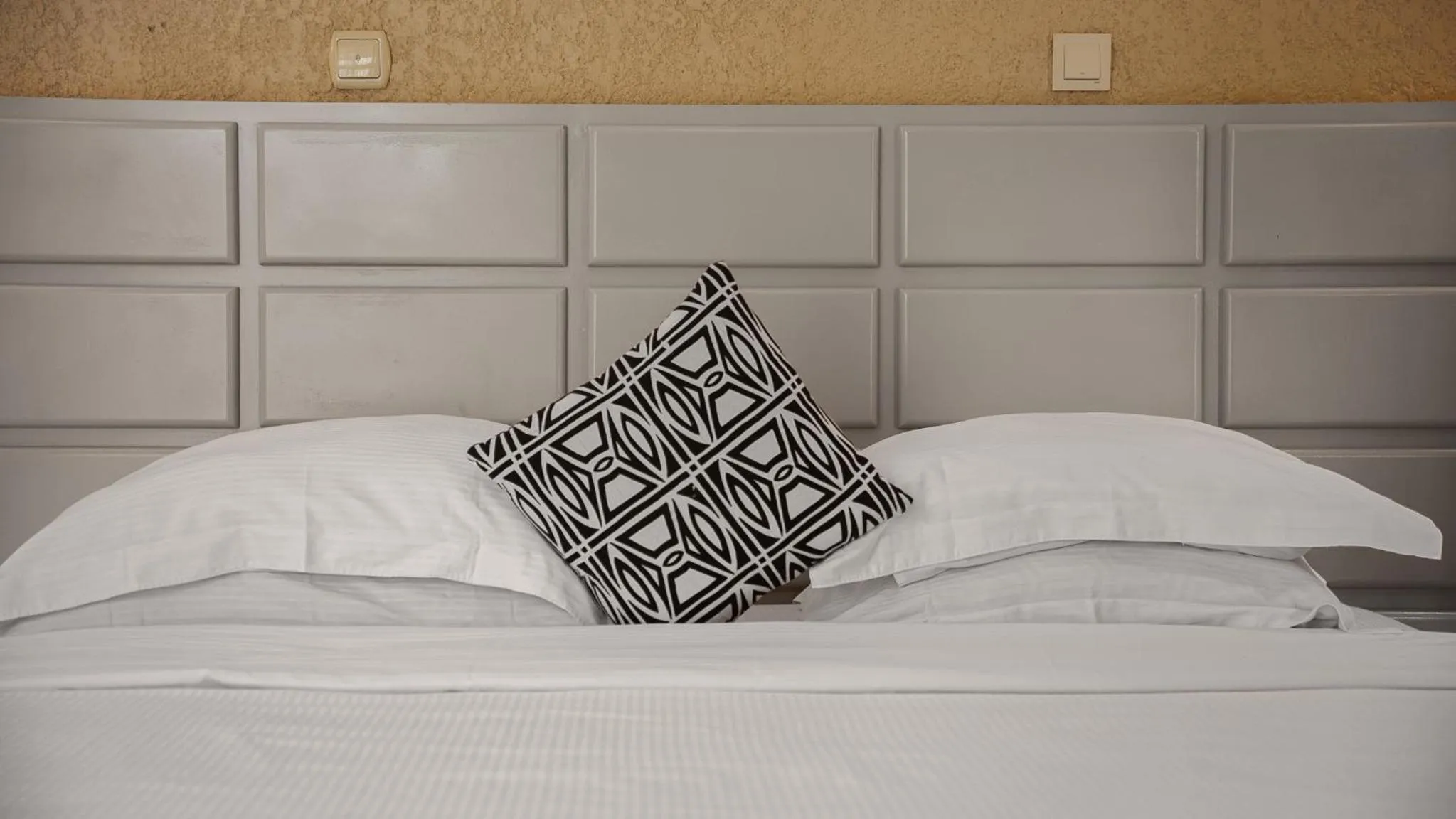 Bed in Quality Inn Hotel Kigali