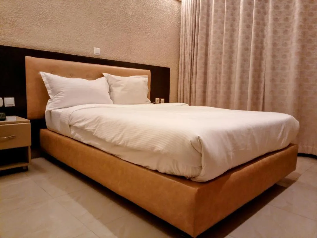Bed in Quality Inn Hotel Kigali