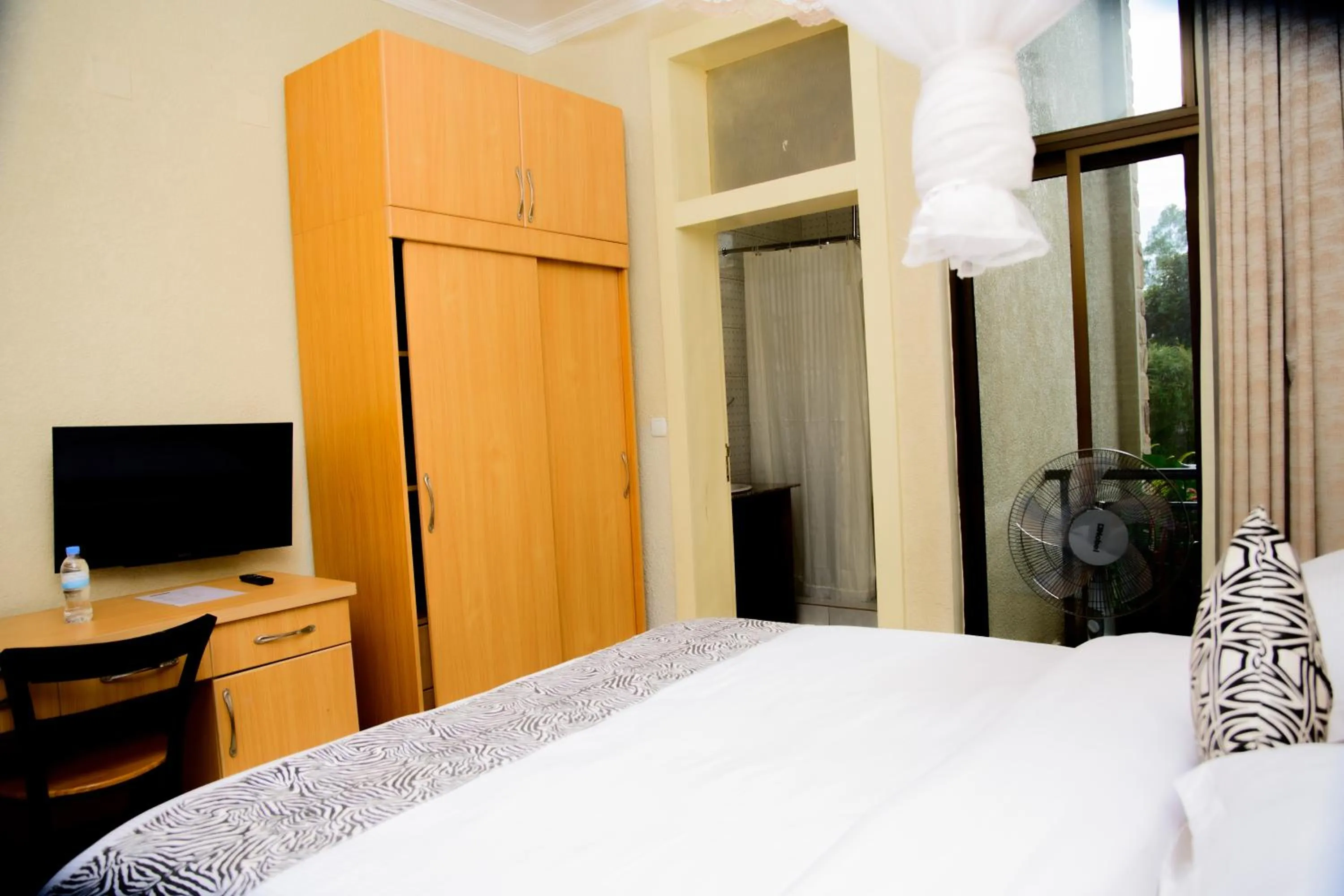 Bed in Quality Inn Hotel Kigali