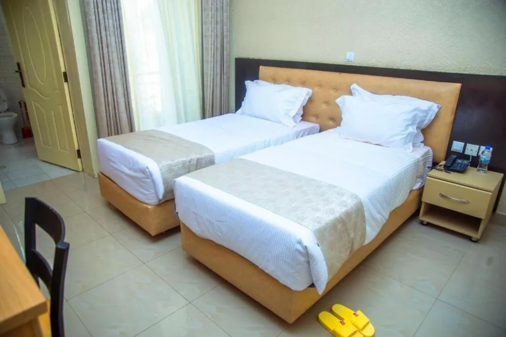 Bed in Quality Inn Hotel Kigali