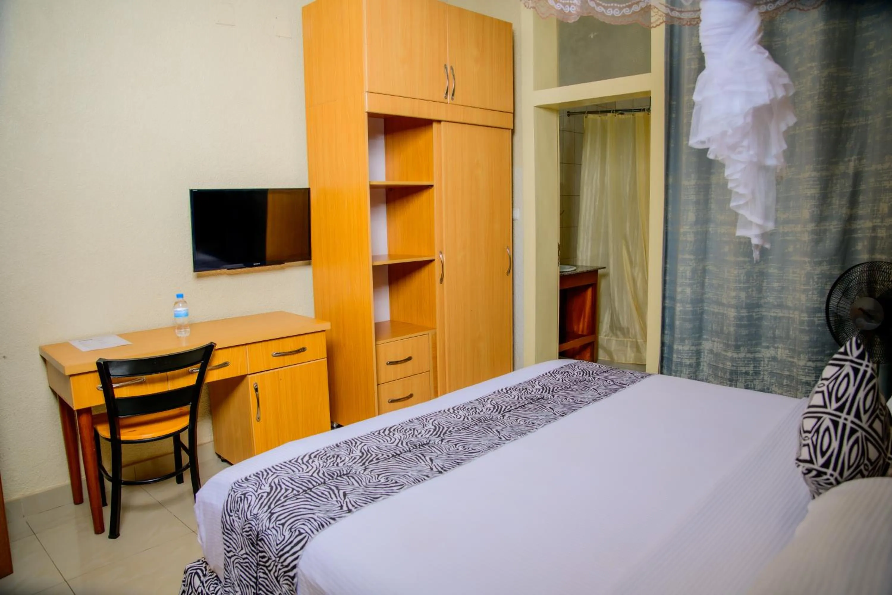 Bed in Quality Inn Hotel Kigali