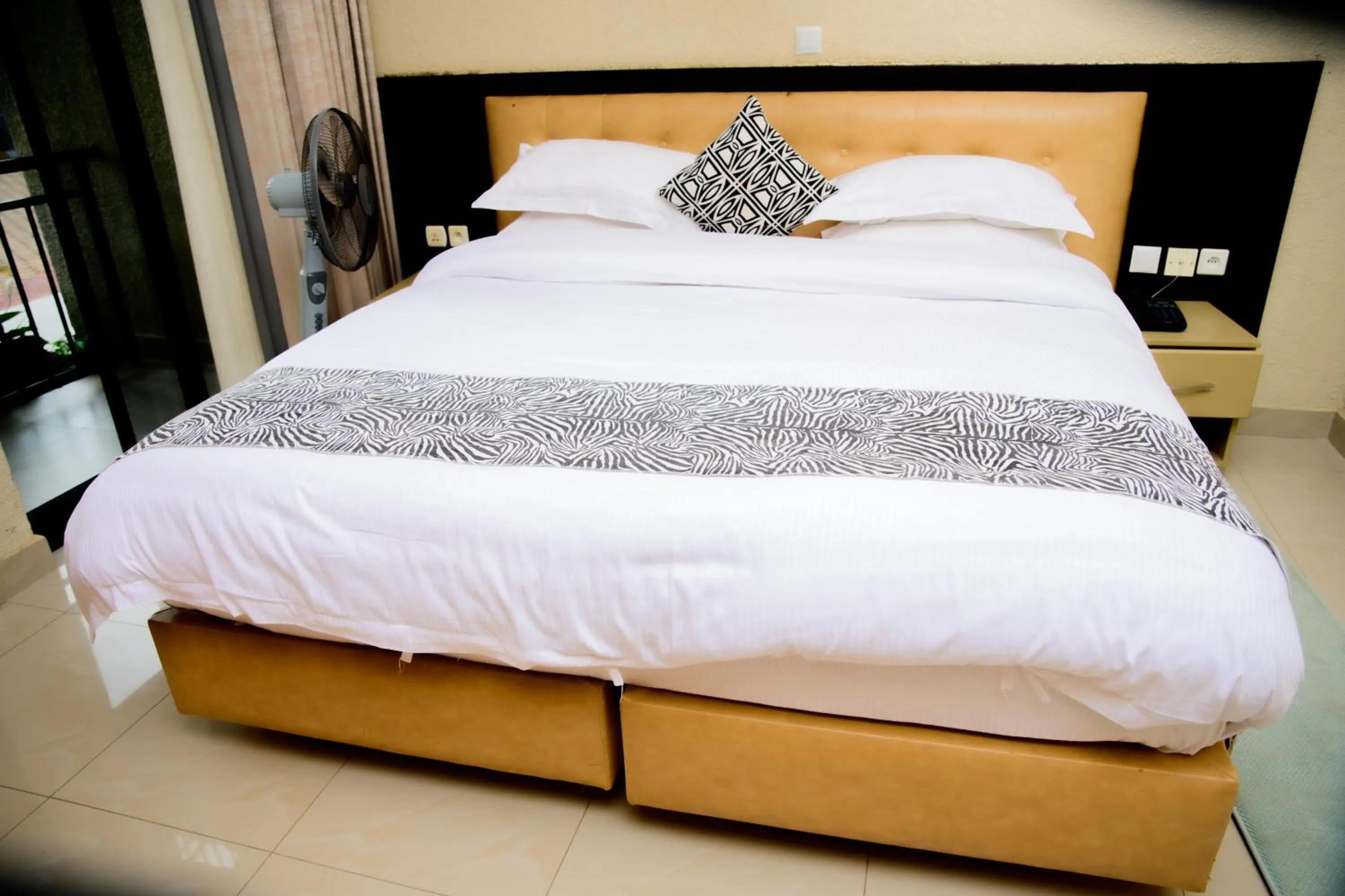 Bed in Quality Inn Hotel Kigali