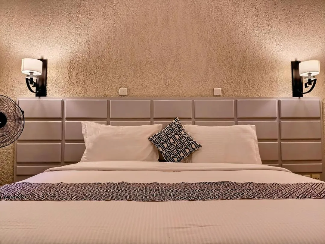 Bed in Quality Inn Hotel Kigali